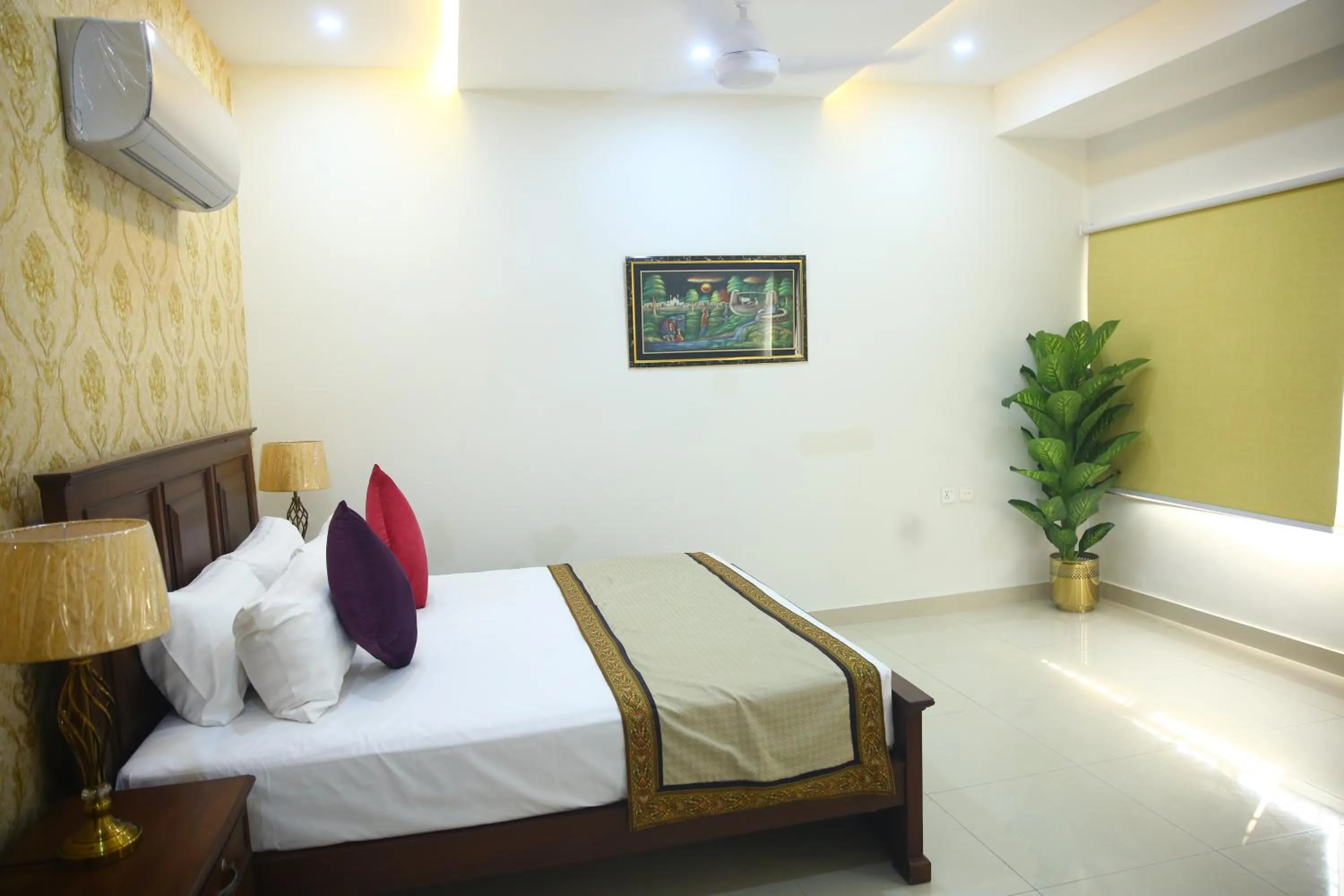 Bed in Gulberg Suites