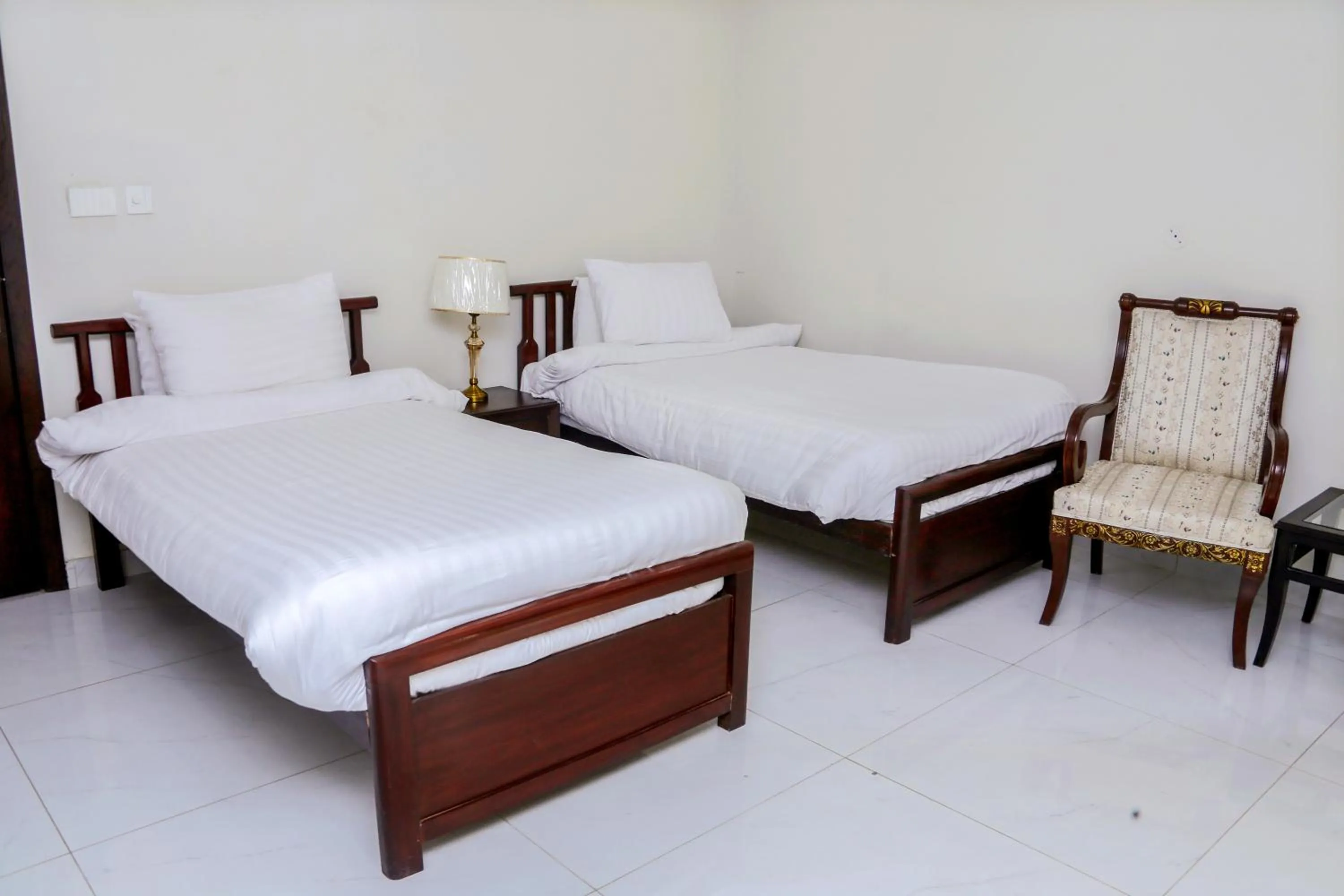 Bed in Gulberg Suites