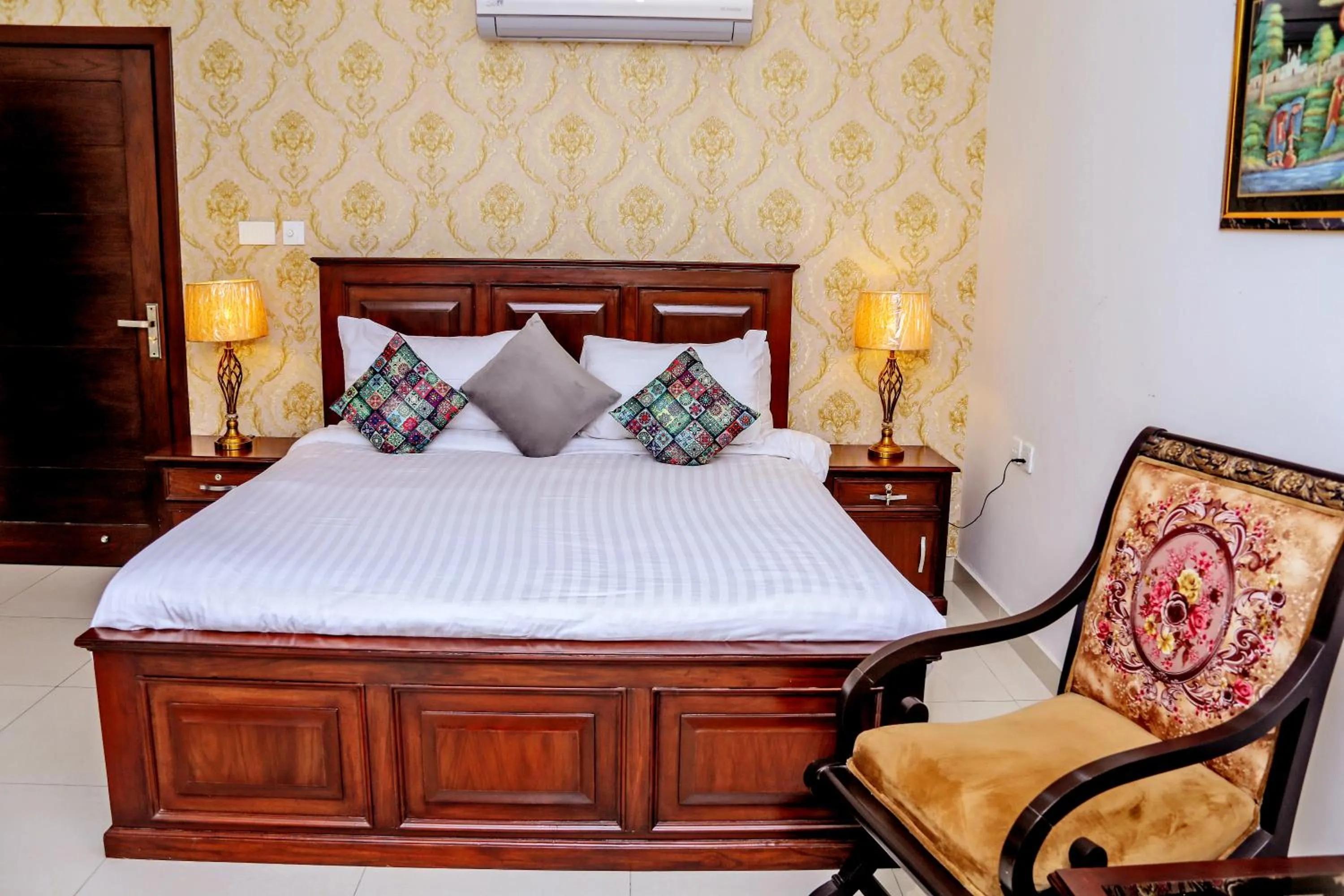 Photo of the whole room, Bed in Gulberg Suites