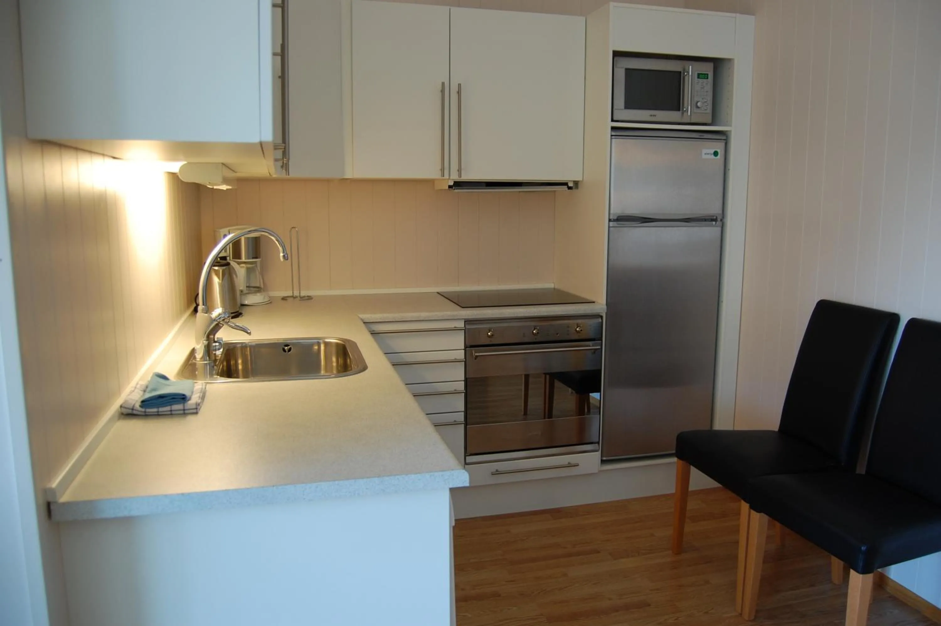 Kitchen or kitchenette in Hamresanden Resort as