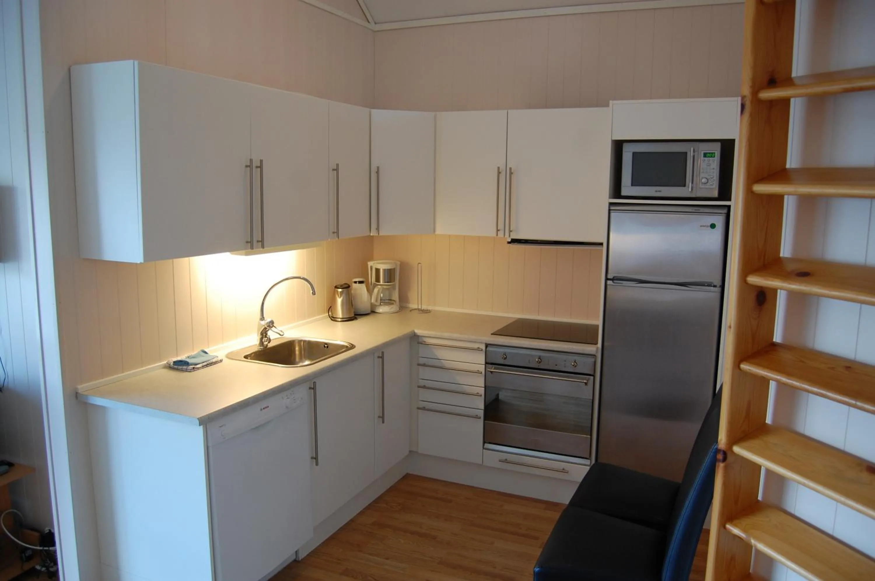 Kitchen or kitchenette in Hamresanden Resort as