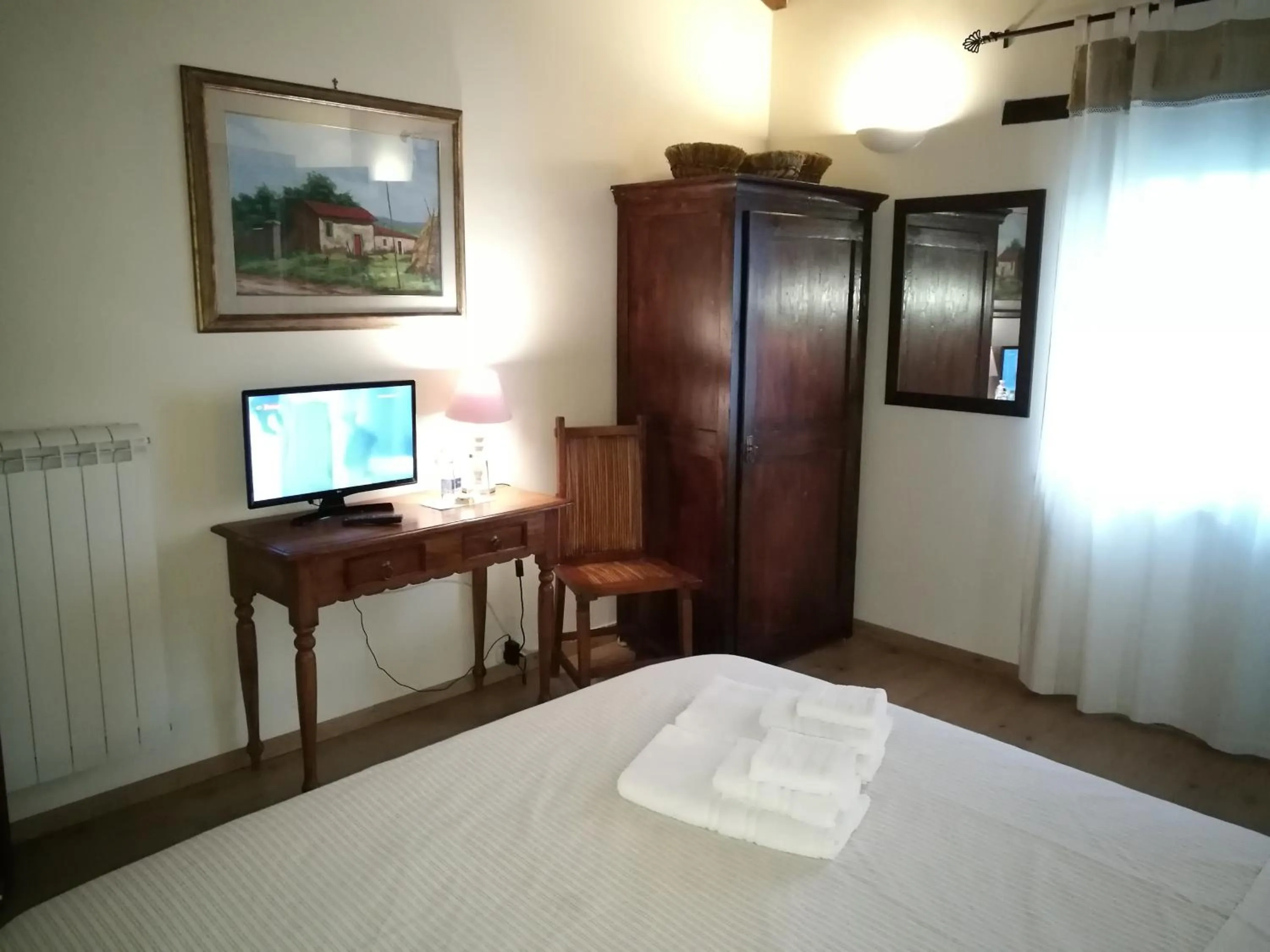 Photo of the whole room, Bed in Podere Pontepietra