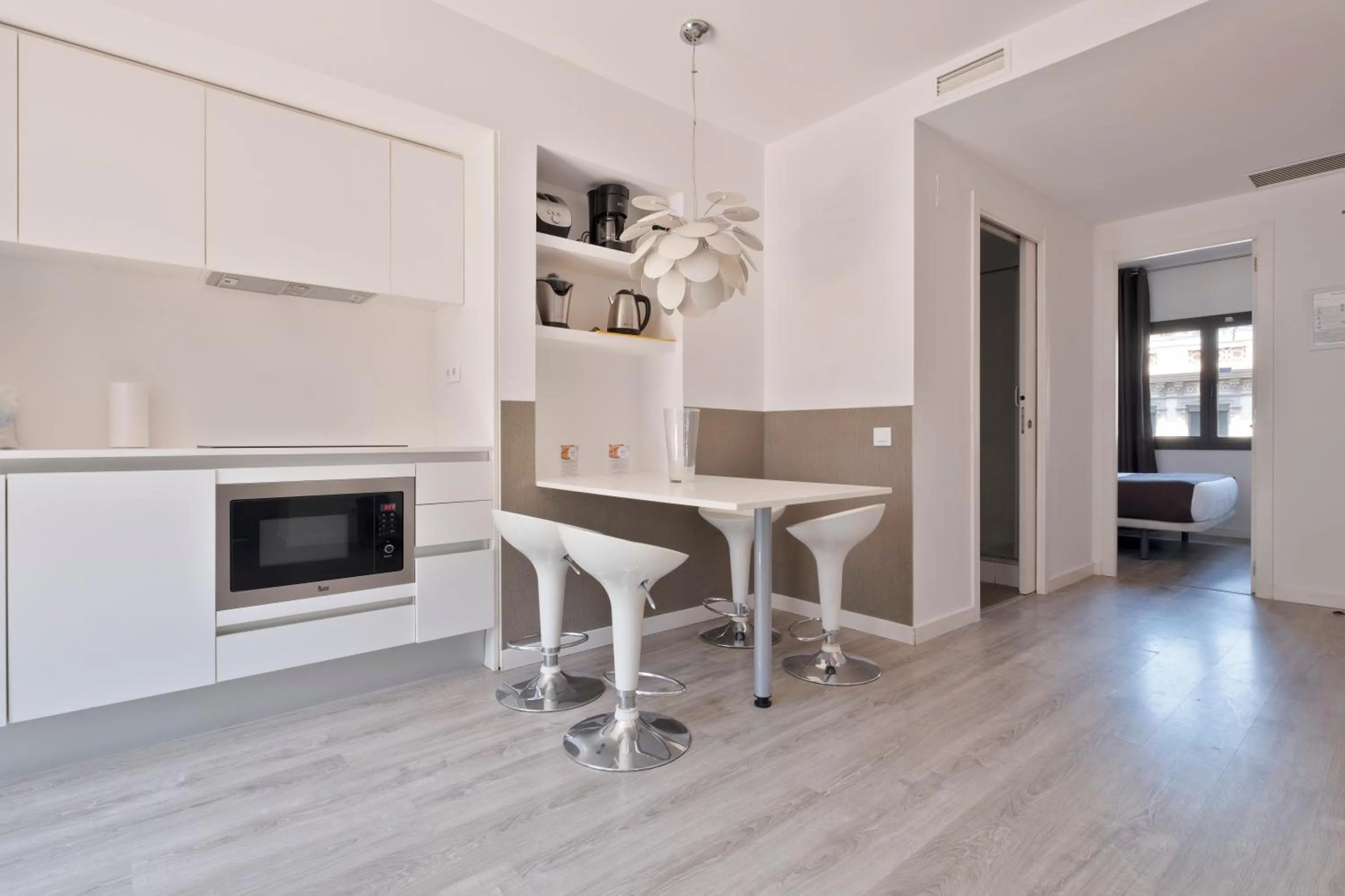 Kitchen or kitchenette in Habitat Apartments ADN