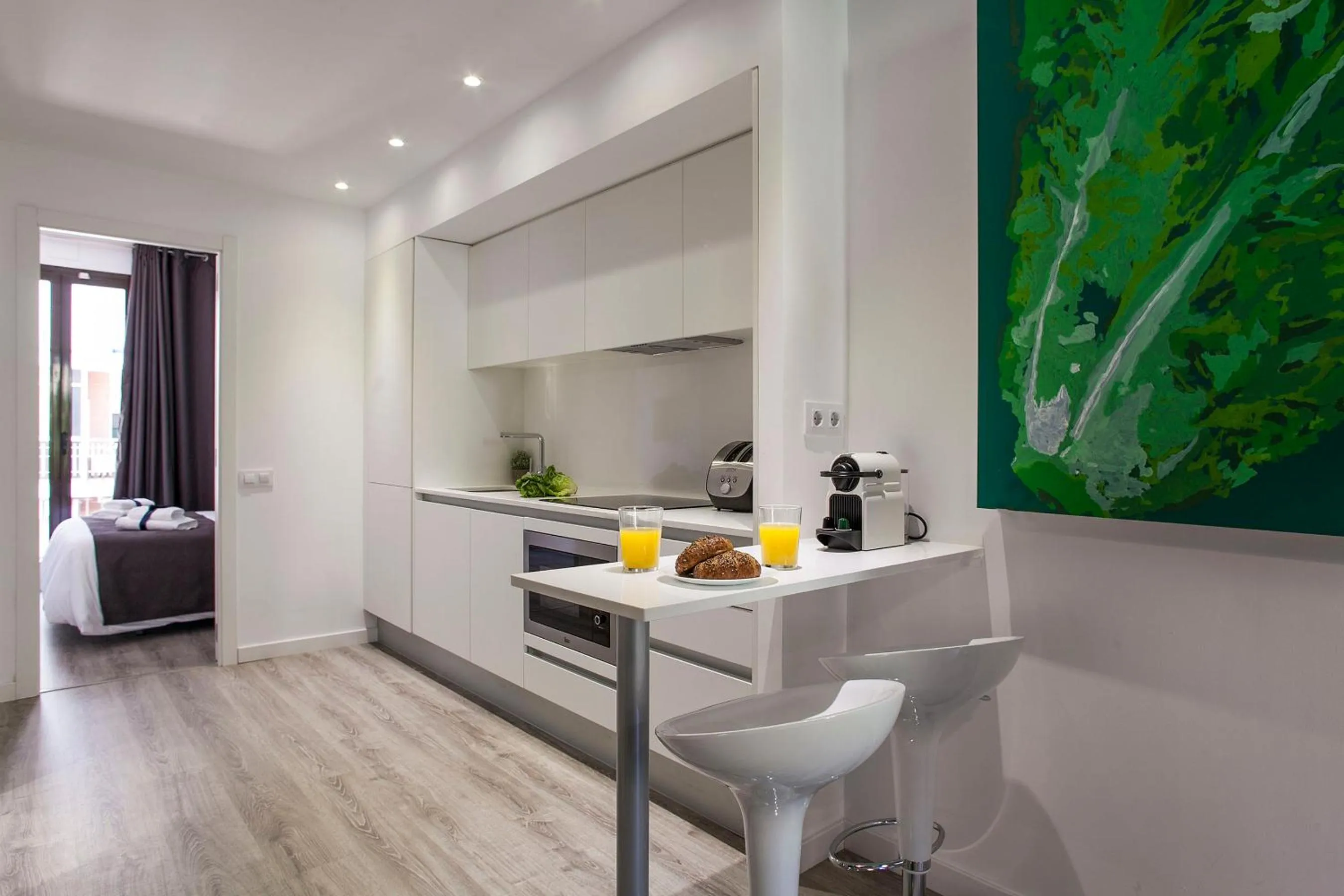 Kitchen or kitchenette in Habitat Apartments ADN