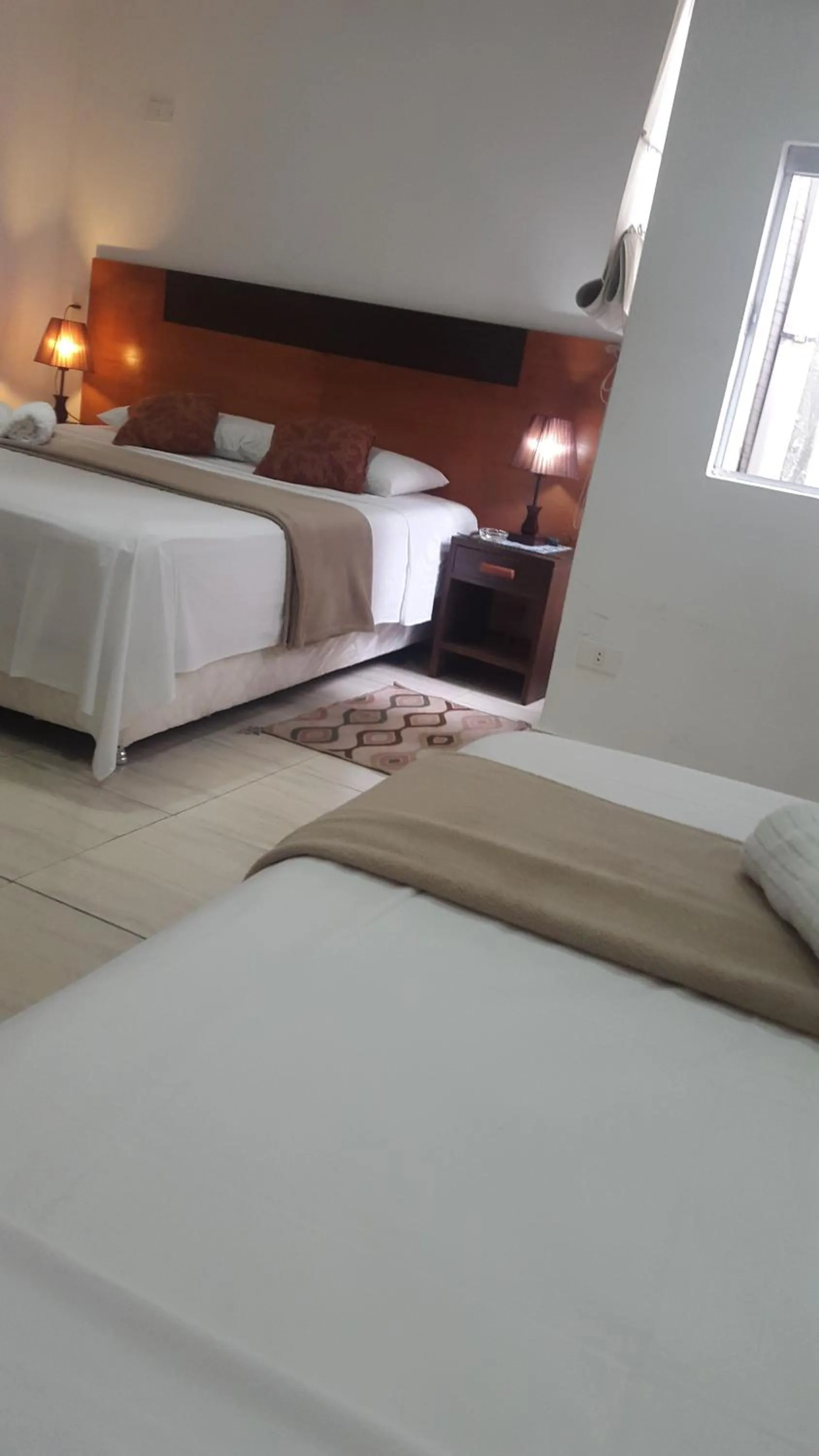 Bed in Giuseppe Suites Hotel