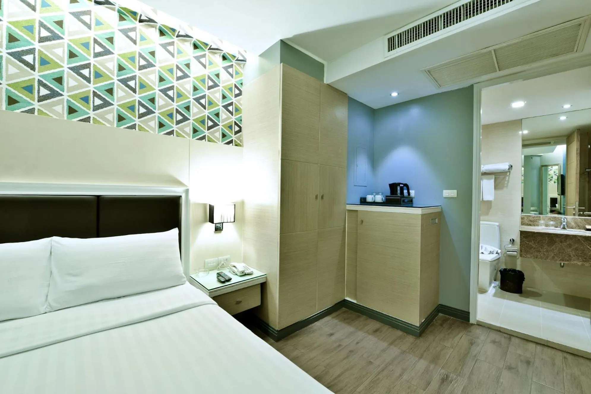 Decorative detail, Bed in Prestige Suites Nana