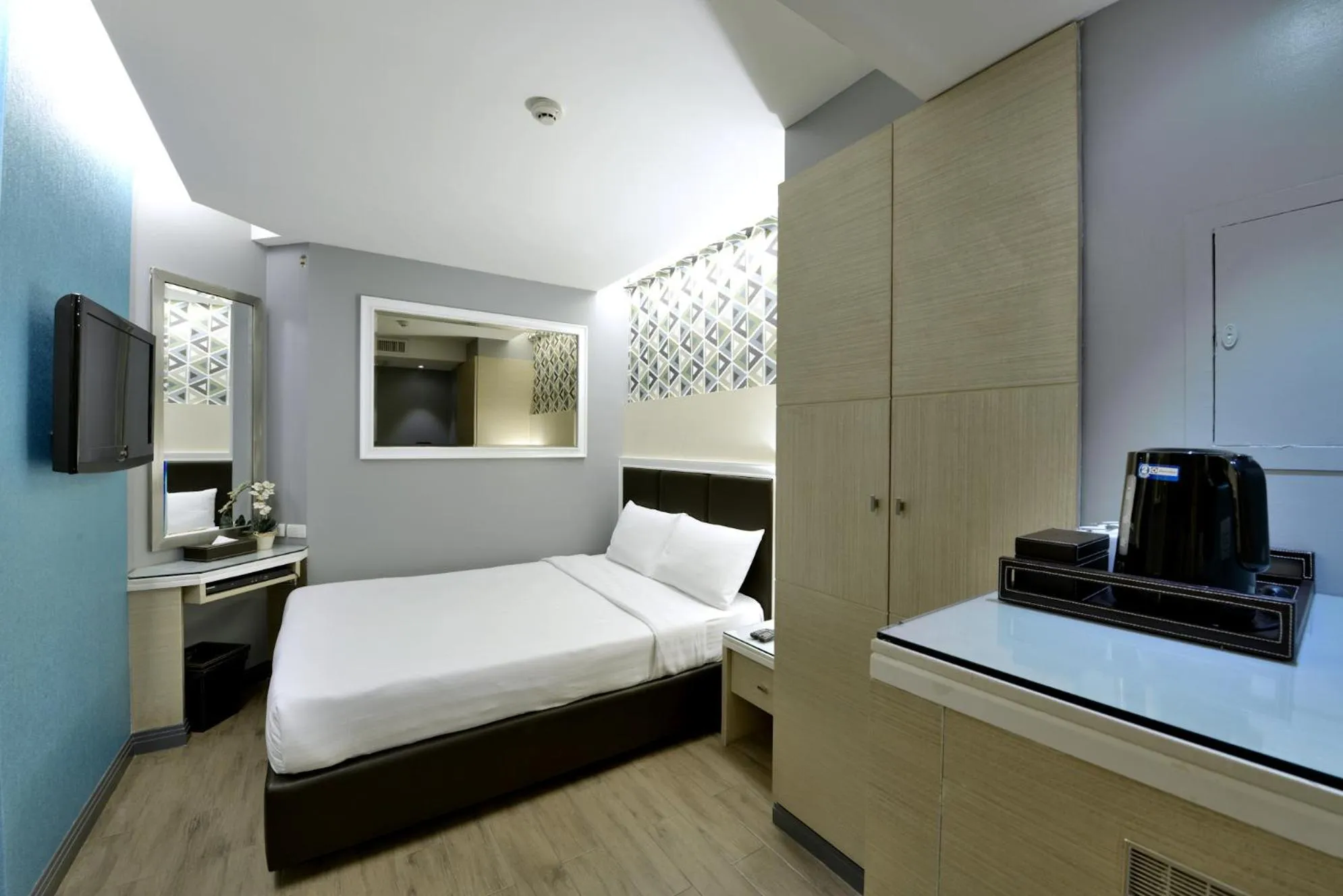 Photo of the whole room, Bed in Prestige Suites Nana