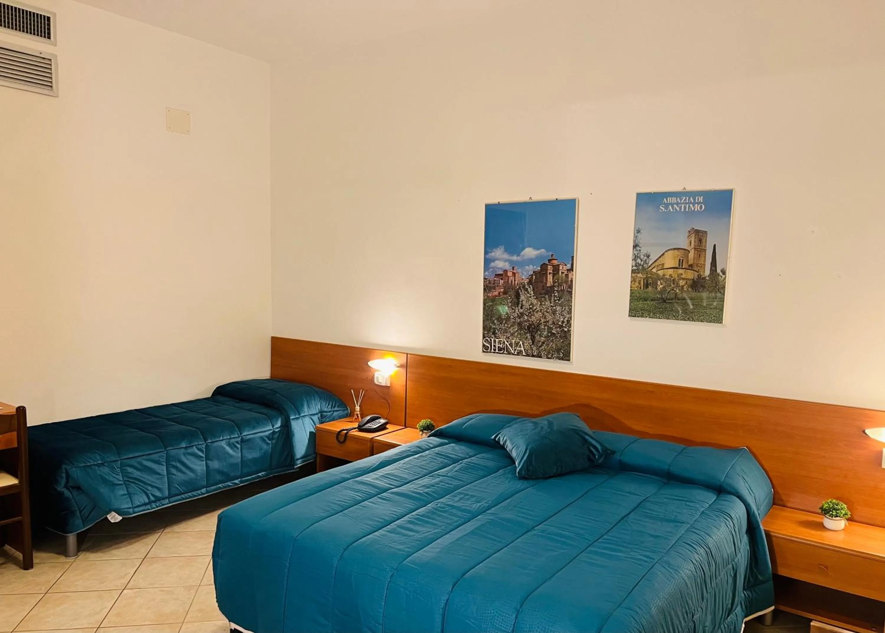 Decorative detail, Bed in Hotel Vico Alto Siena