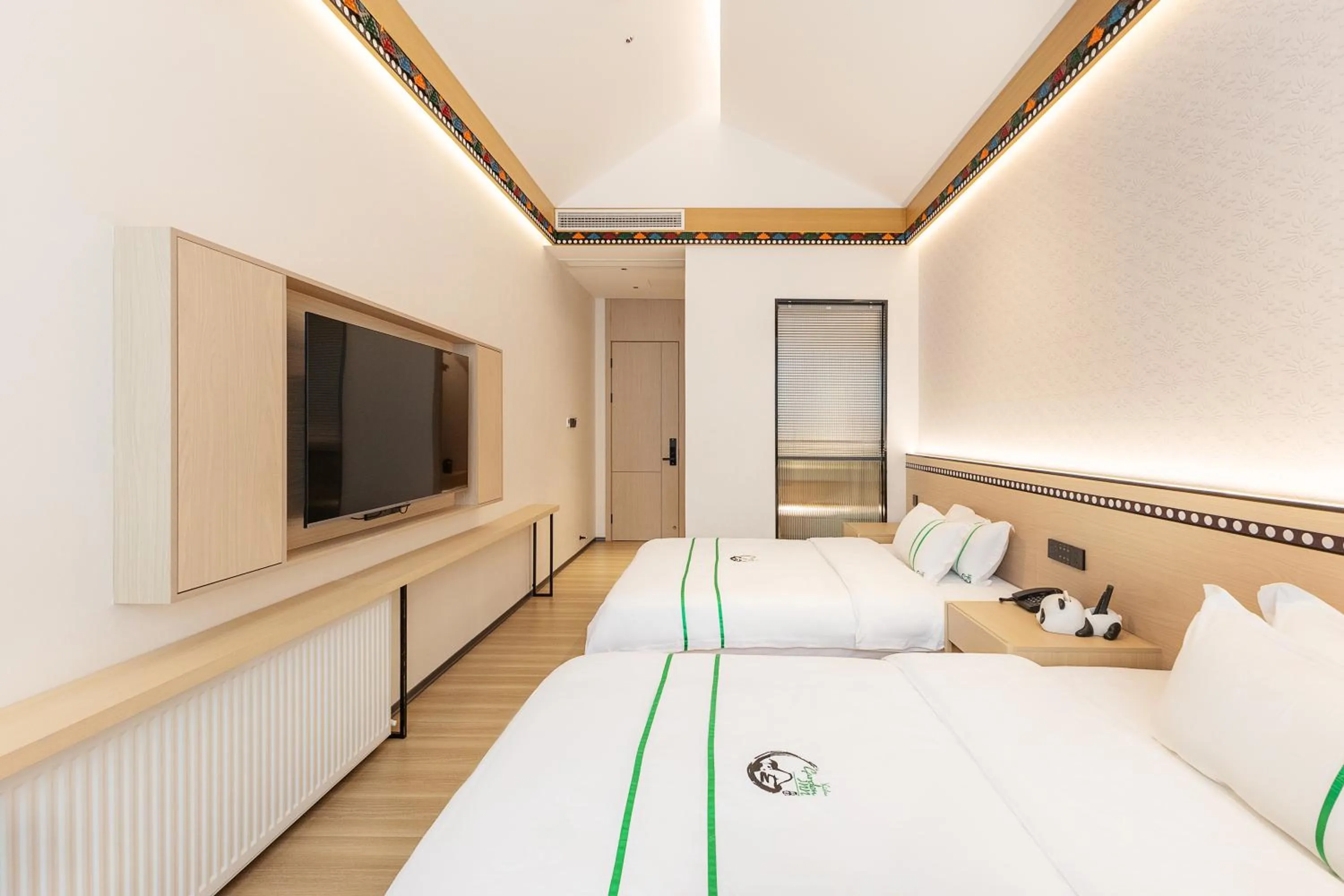 Bed in Xishu Garden Inn - Travel Agency service - Car Rent service - English Speaking