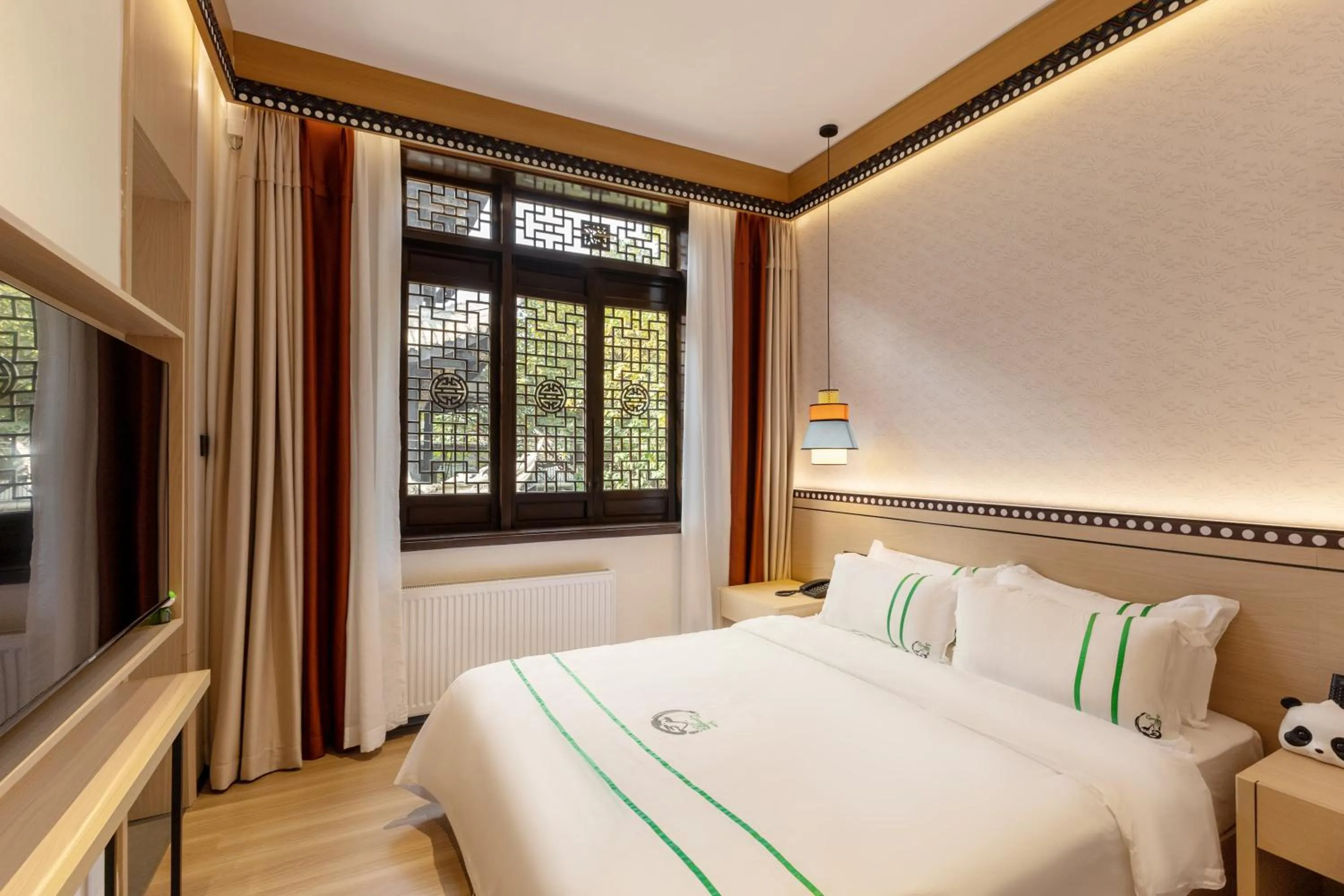 Bed in Xishu Garden Inn - Travel Agency service - Car Rent service - English Speaking