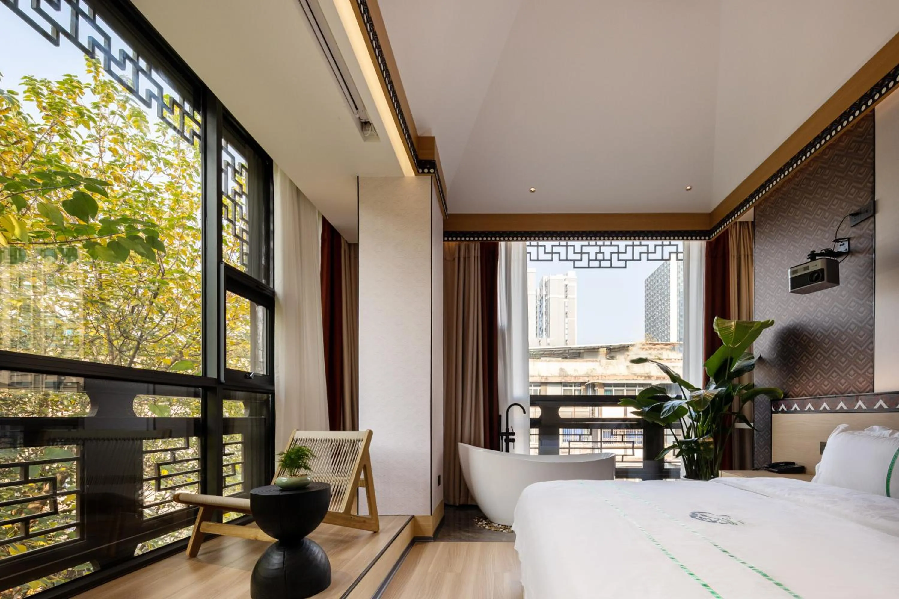 Photo of the whole room, Bed in Xishu Garden Inn - Travel Agency service - Car Rent service - English Speaking