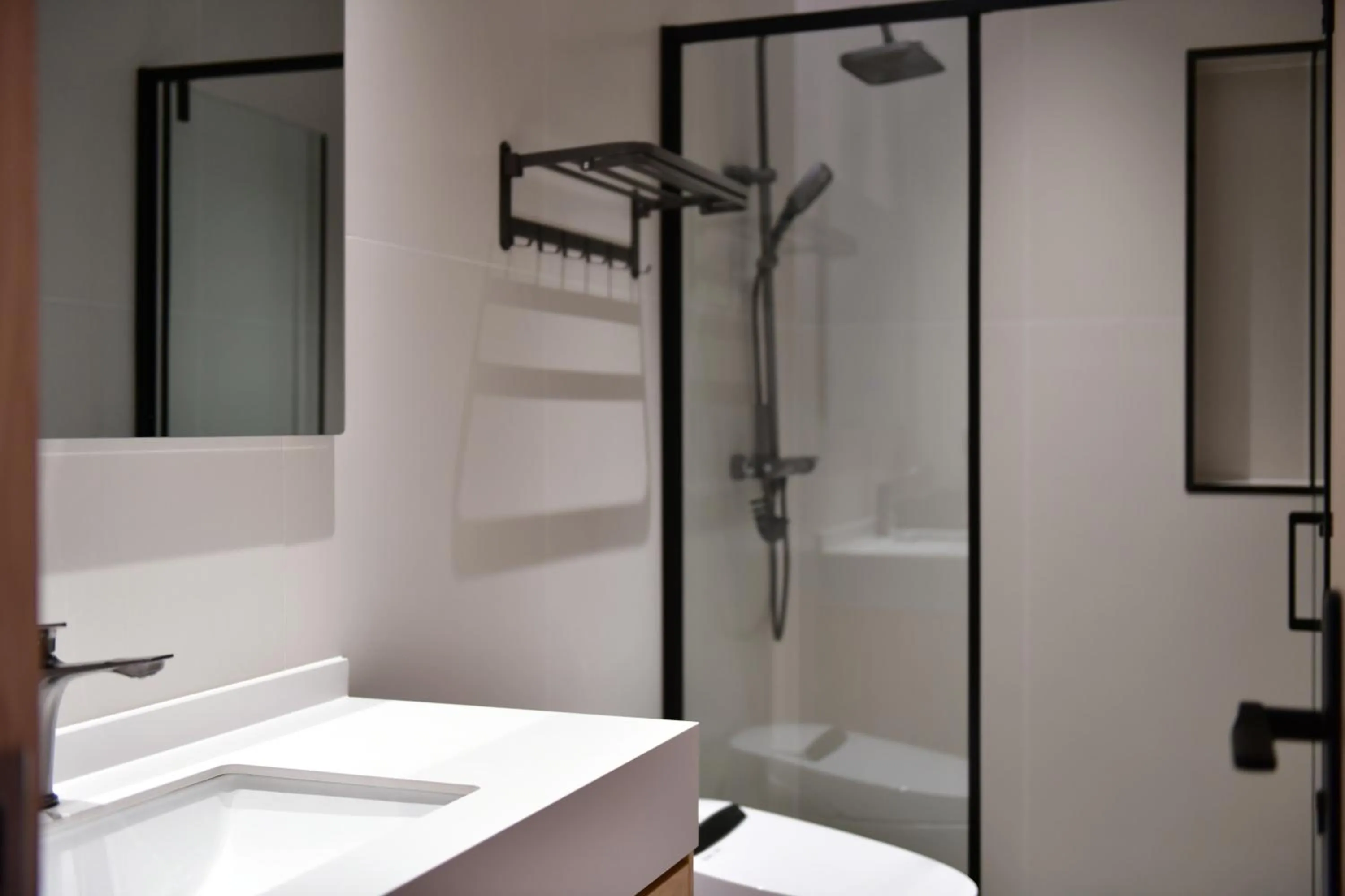 Shower in Xishu Garden Inn - Travel Agency service - Car Rent service - English Speaking