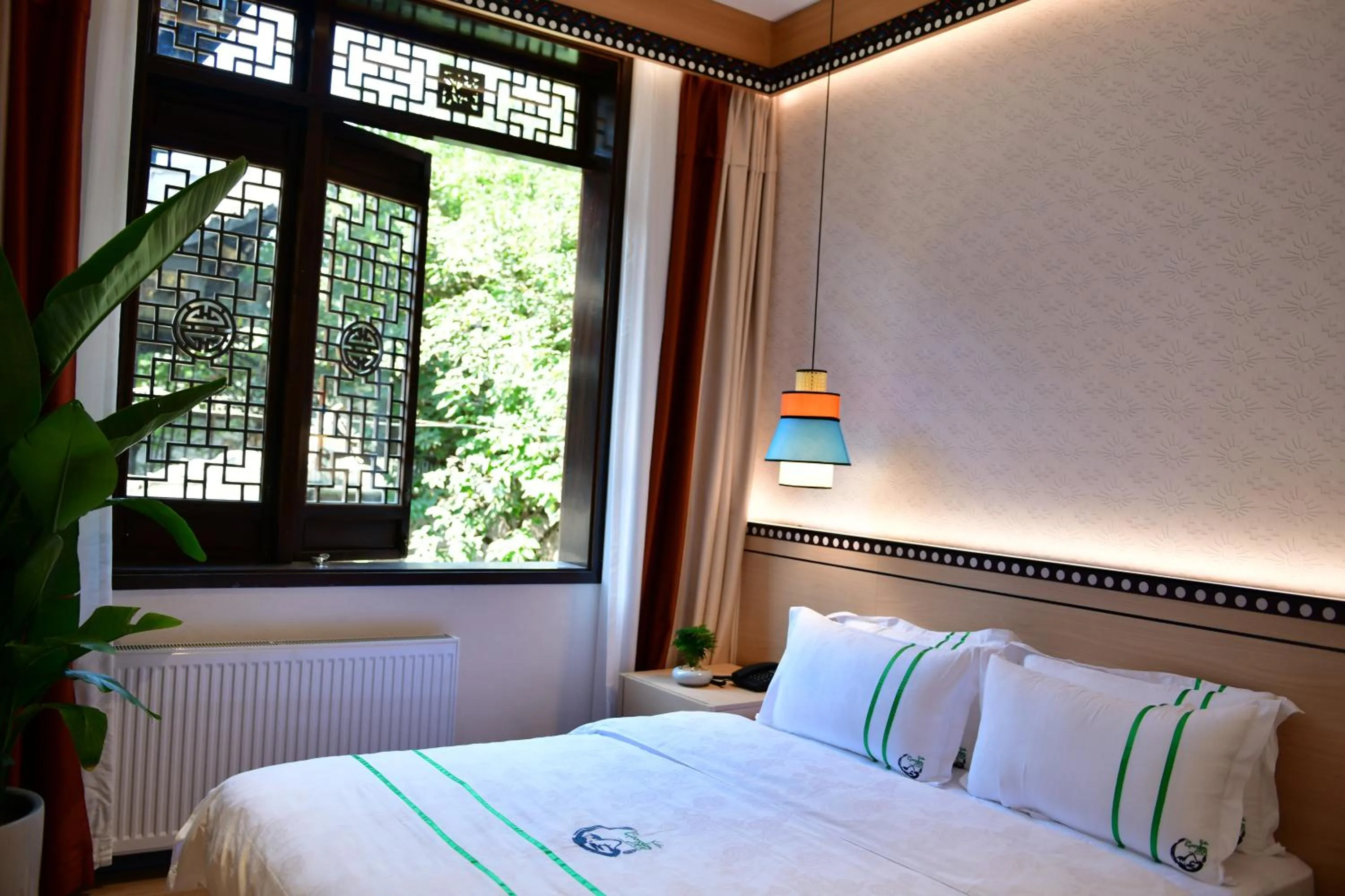 Bed in Xishu Garden Inn - Travel Agency service - Car Rent service - English Speaking