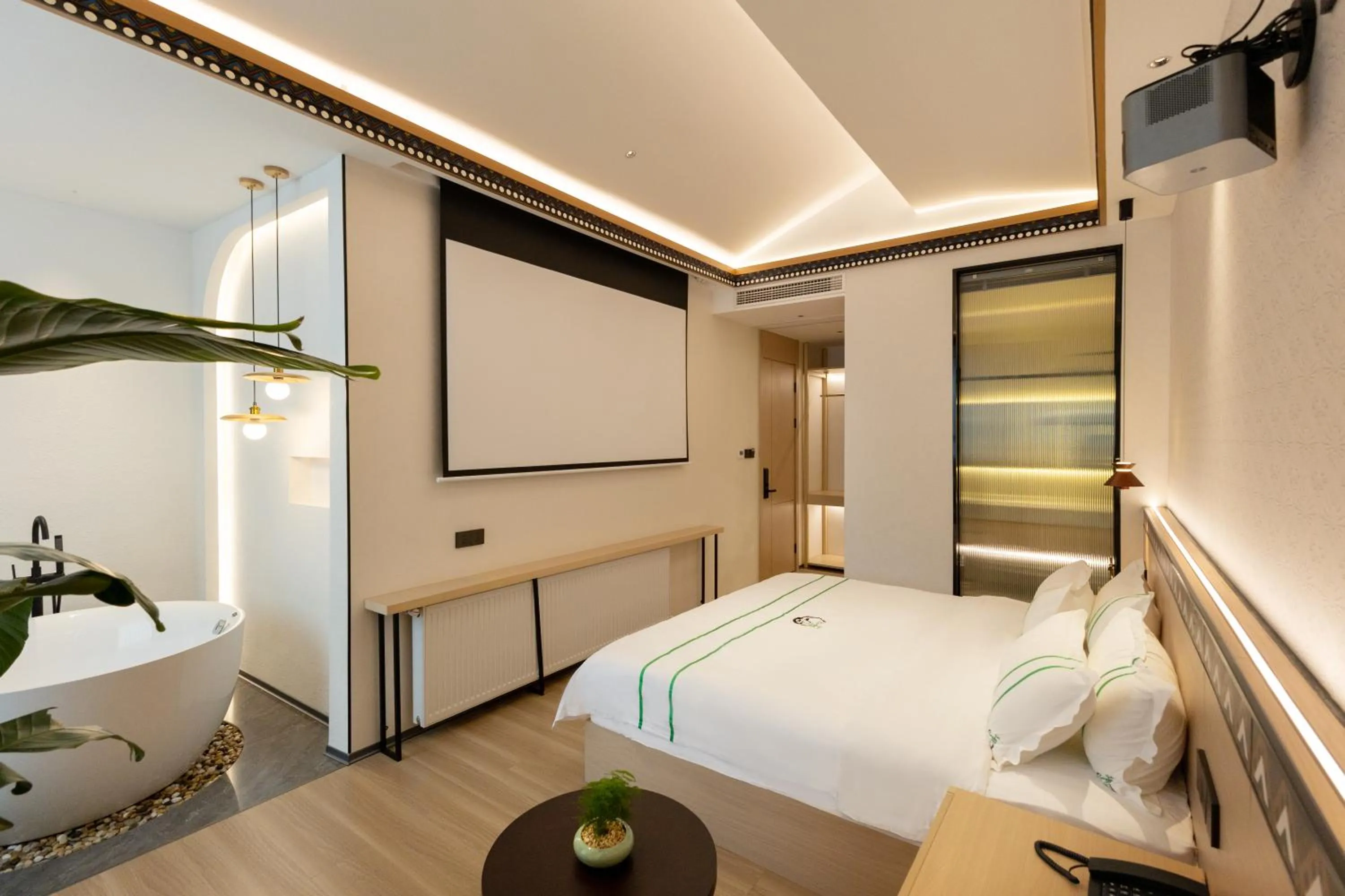 Photo of the whole room, Bed in Xishu Garden Inn - Travel Agency service - Car Rent service - English Speaking