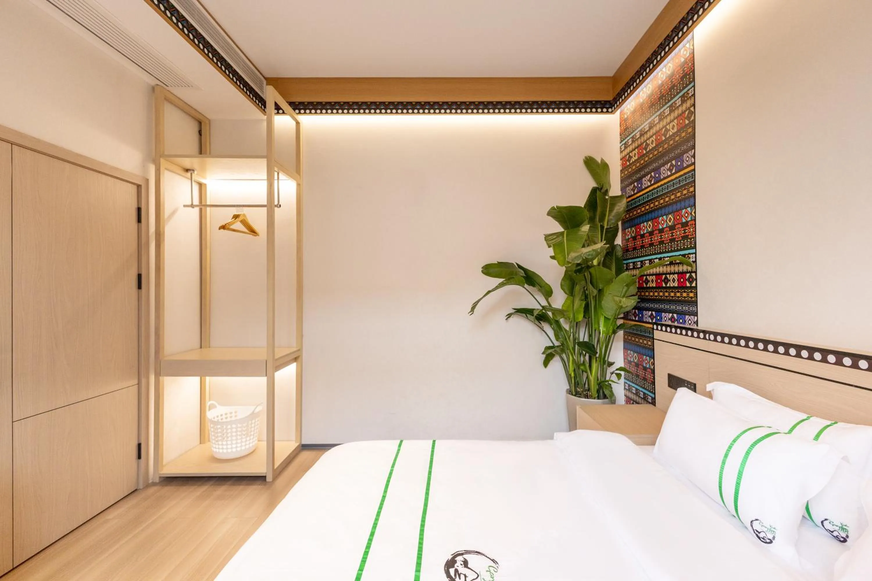 Bed in Xishu Garden Inn - Travel Agency service - Car Rent service - English Speaking