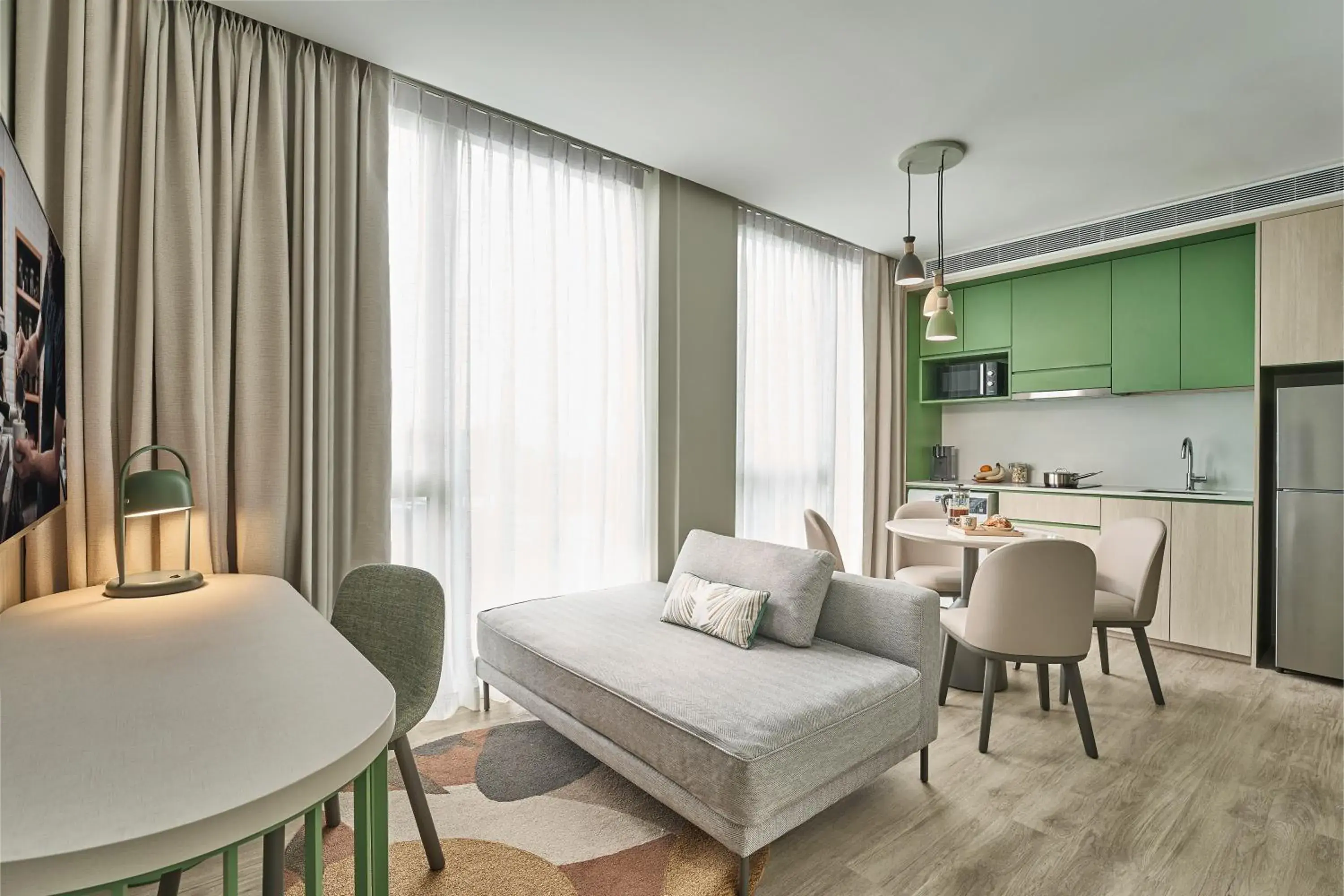 Living room, Bed in Citadines Science Park Singapore Living room, Bed in Citadines Science Park Singapore