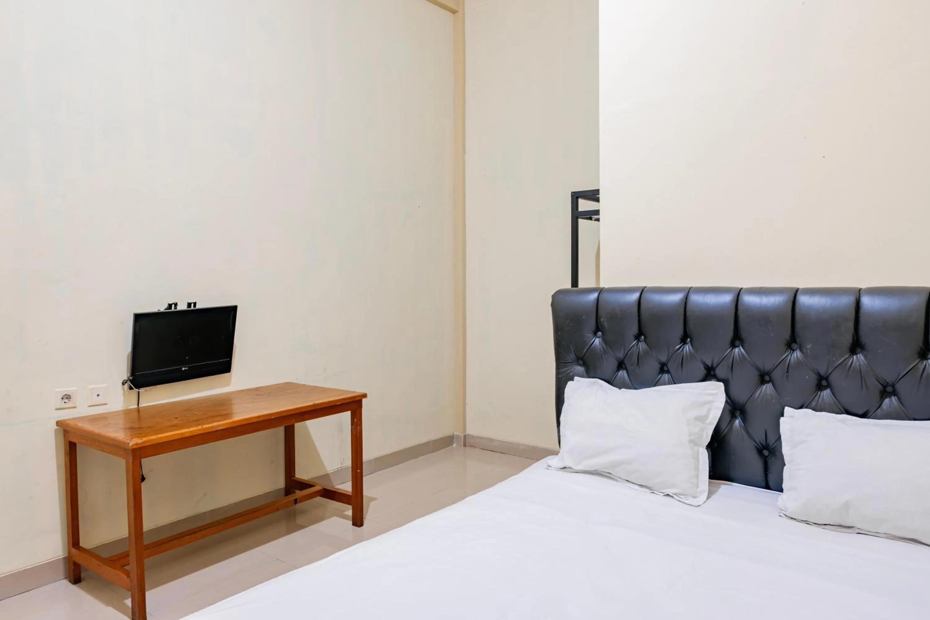 Bedroom in Hotel O Rinjani Guest House