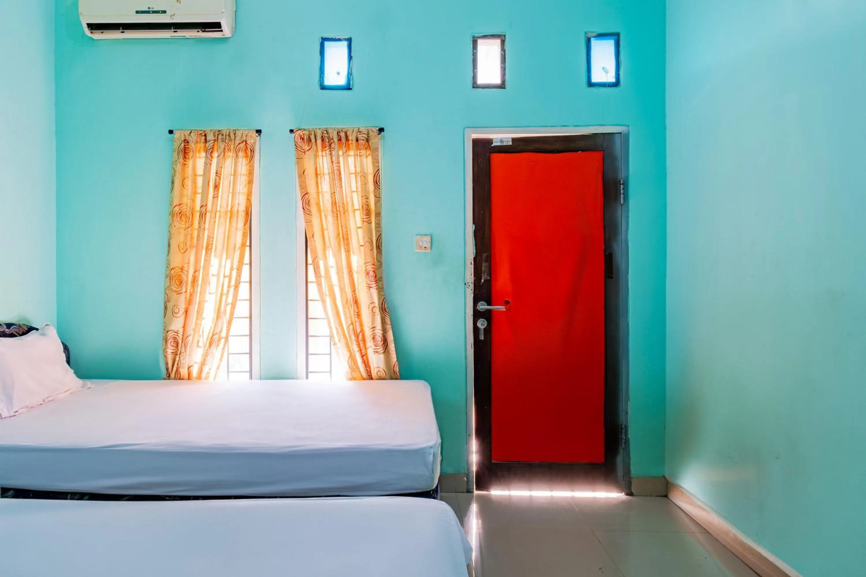 Bedroom in Hotel O Rinjani Guest House