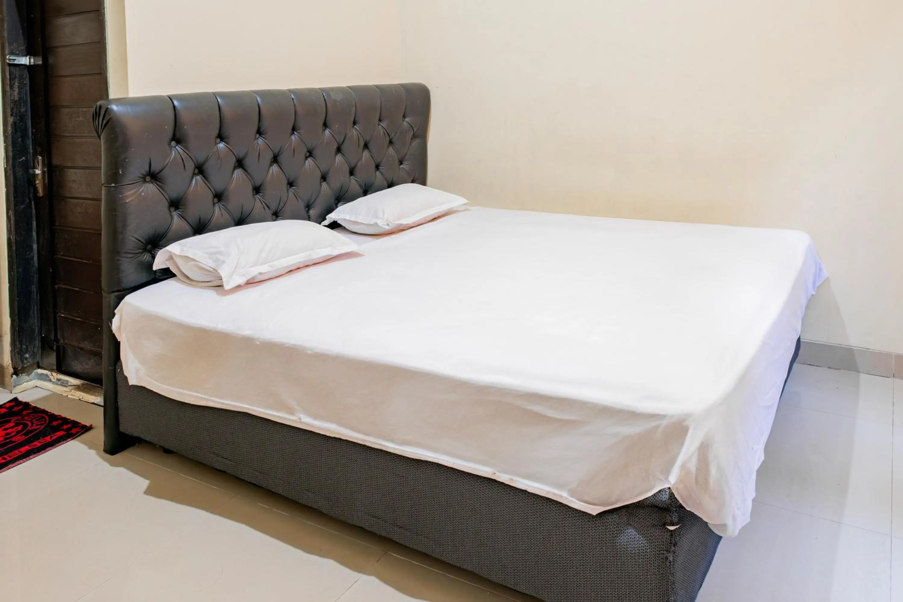 Bedroom in Hotel O Rinjani Guest House