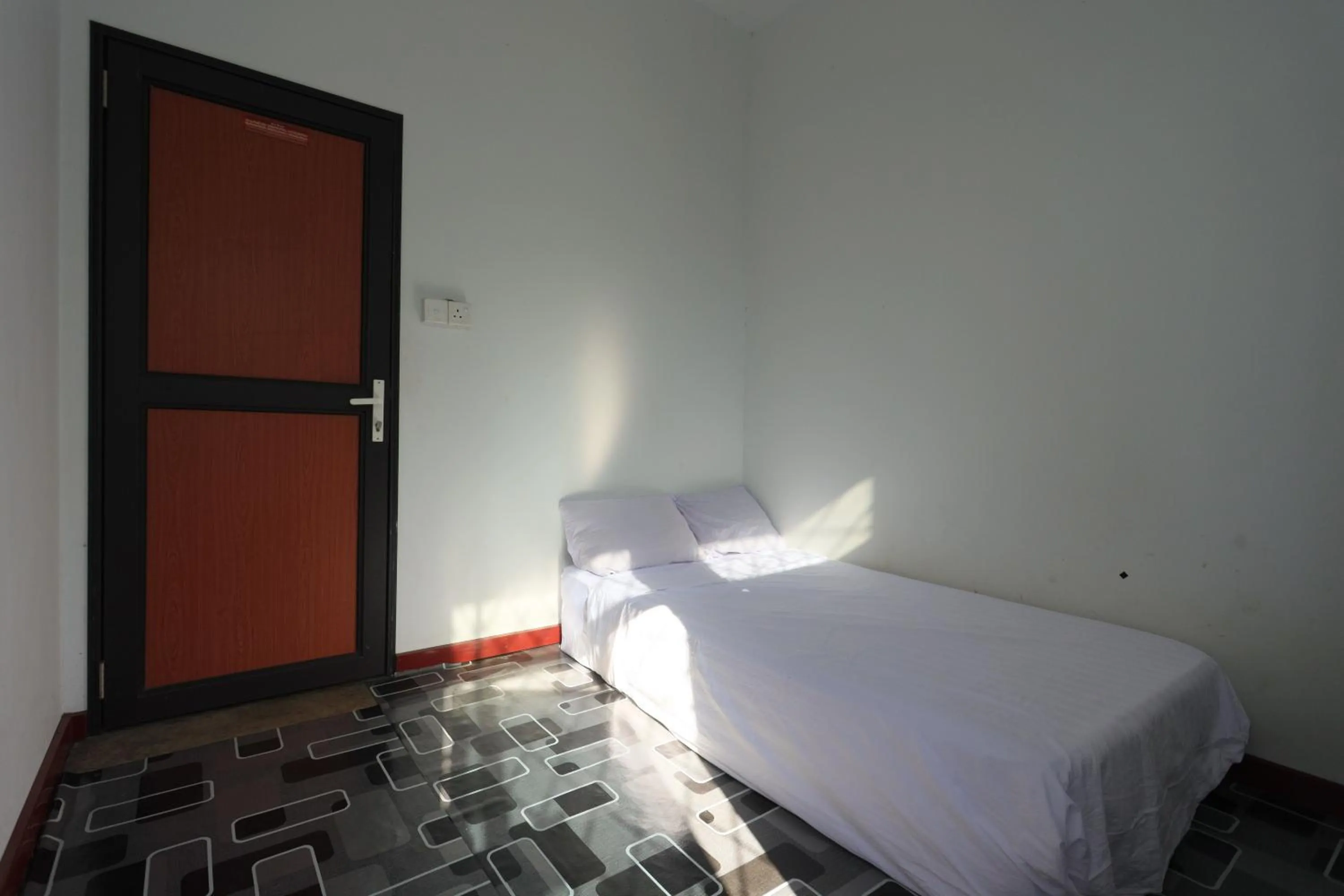 Bedroom in Hotel O Homestay OrangeNearNagoya Hill Shopping Mall