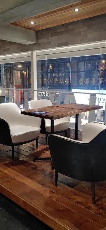 Seating area in KOZAYO Hongdae Hostel