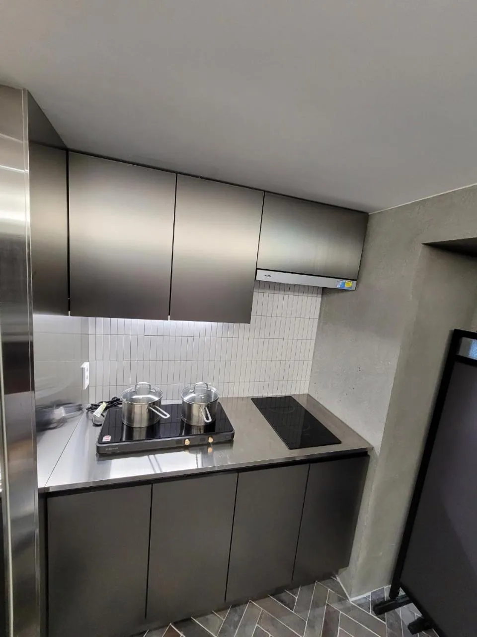 Communal kitchen in KOZAYO Hongdae Hostel