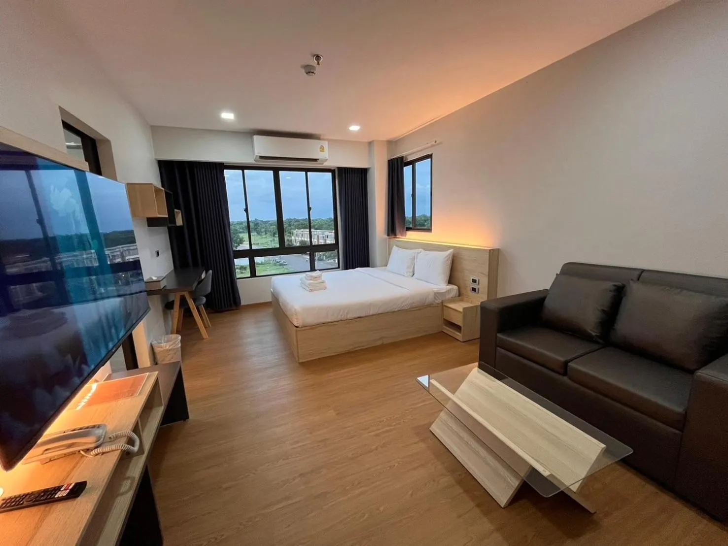 Bed in JIA HAUS Hotel Apartment