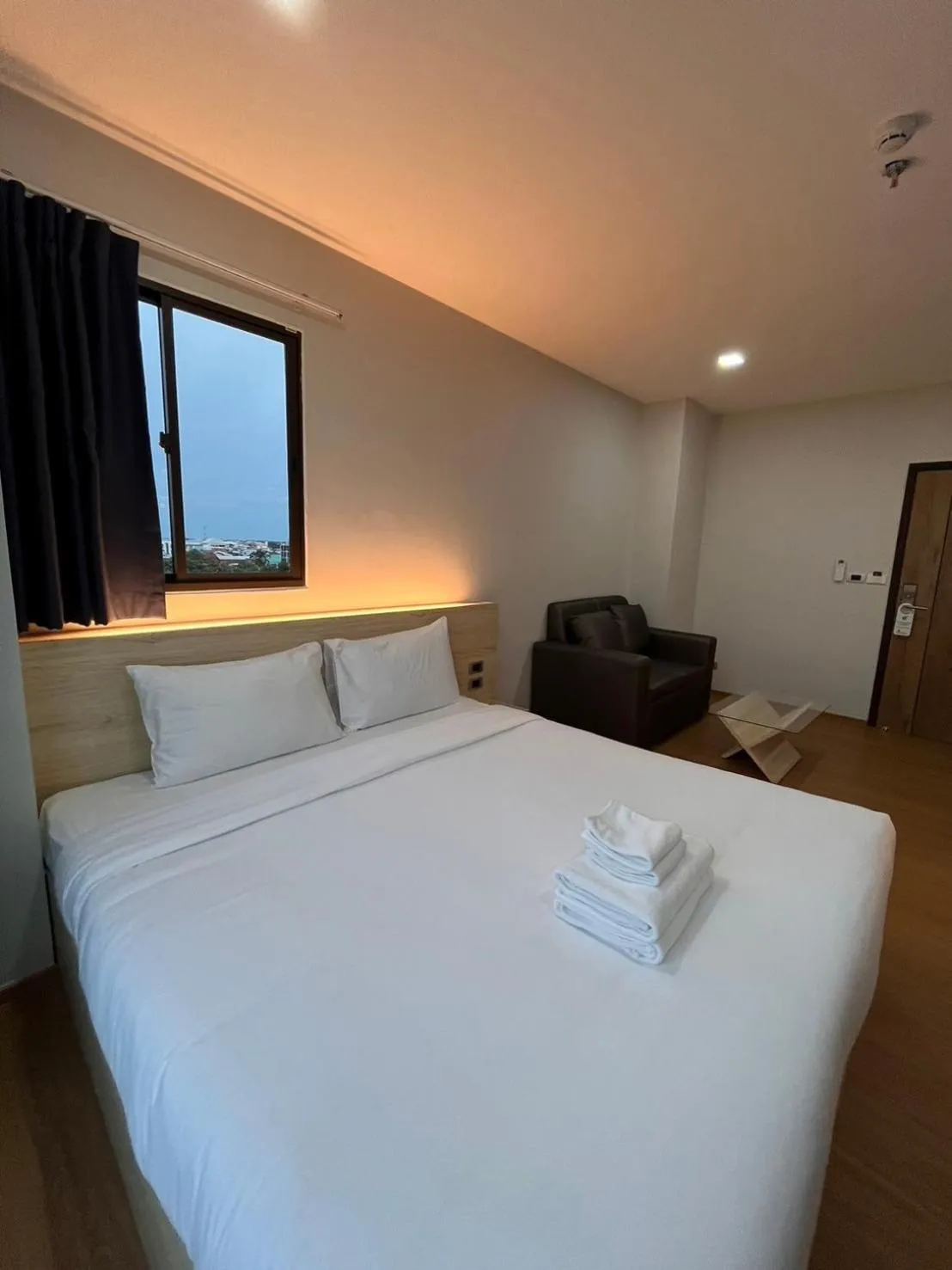 Bed in JIA HAUS Hotel Apartment