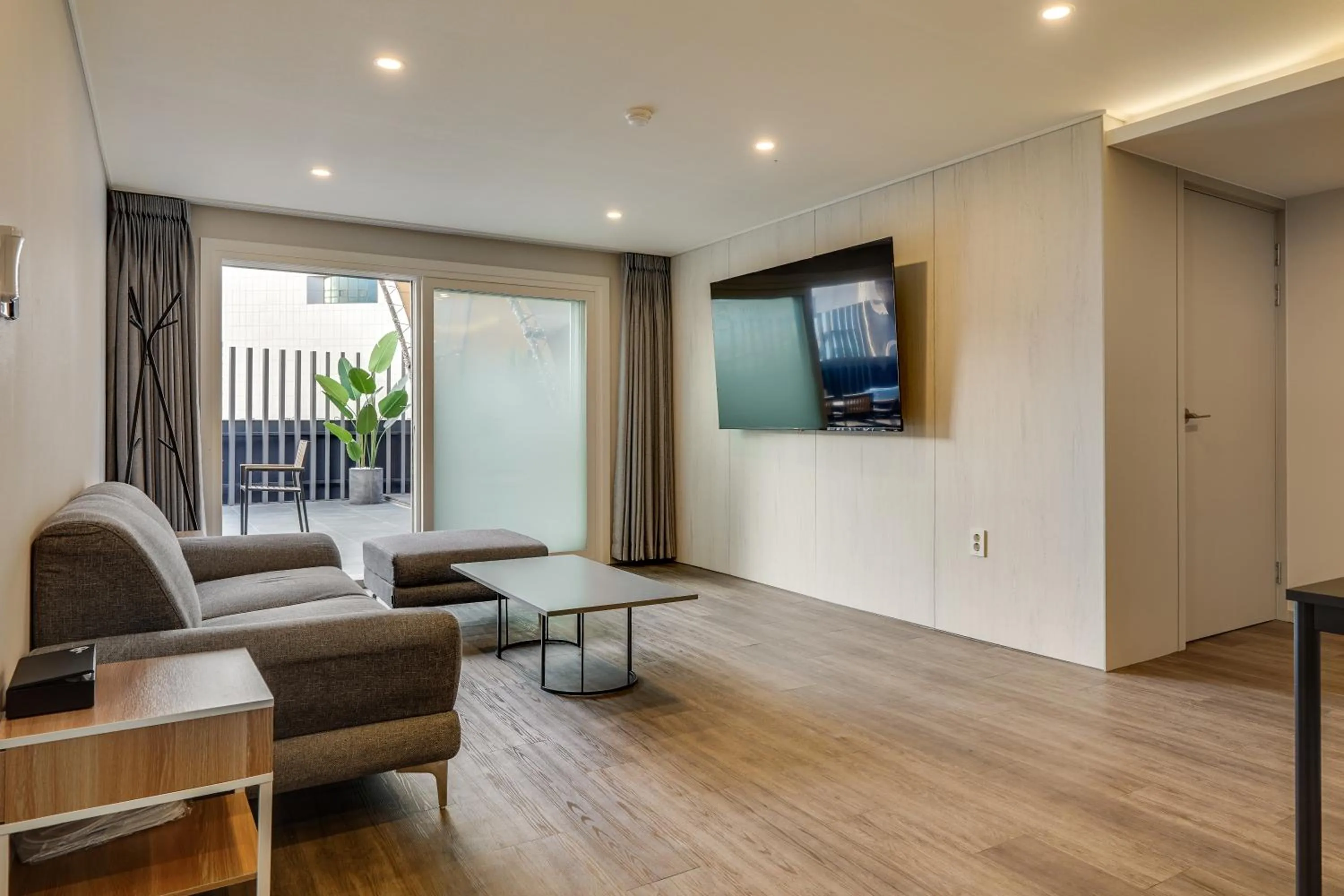 Living room in Two H Hotel