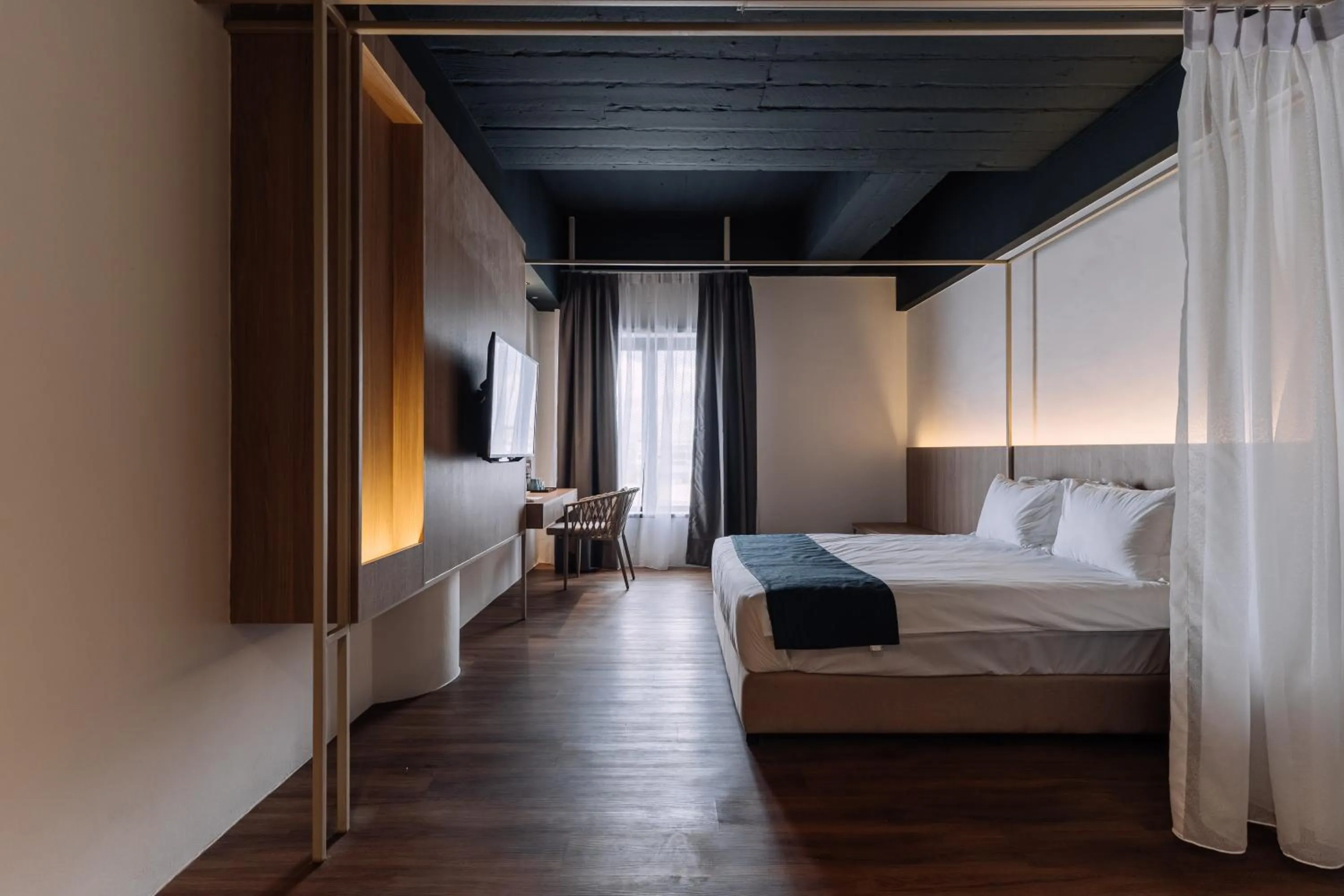 Bedroom, Bed in Impiana by Roxy Hotel