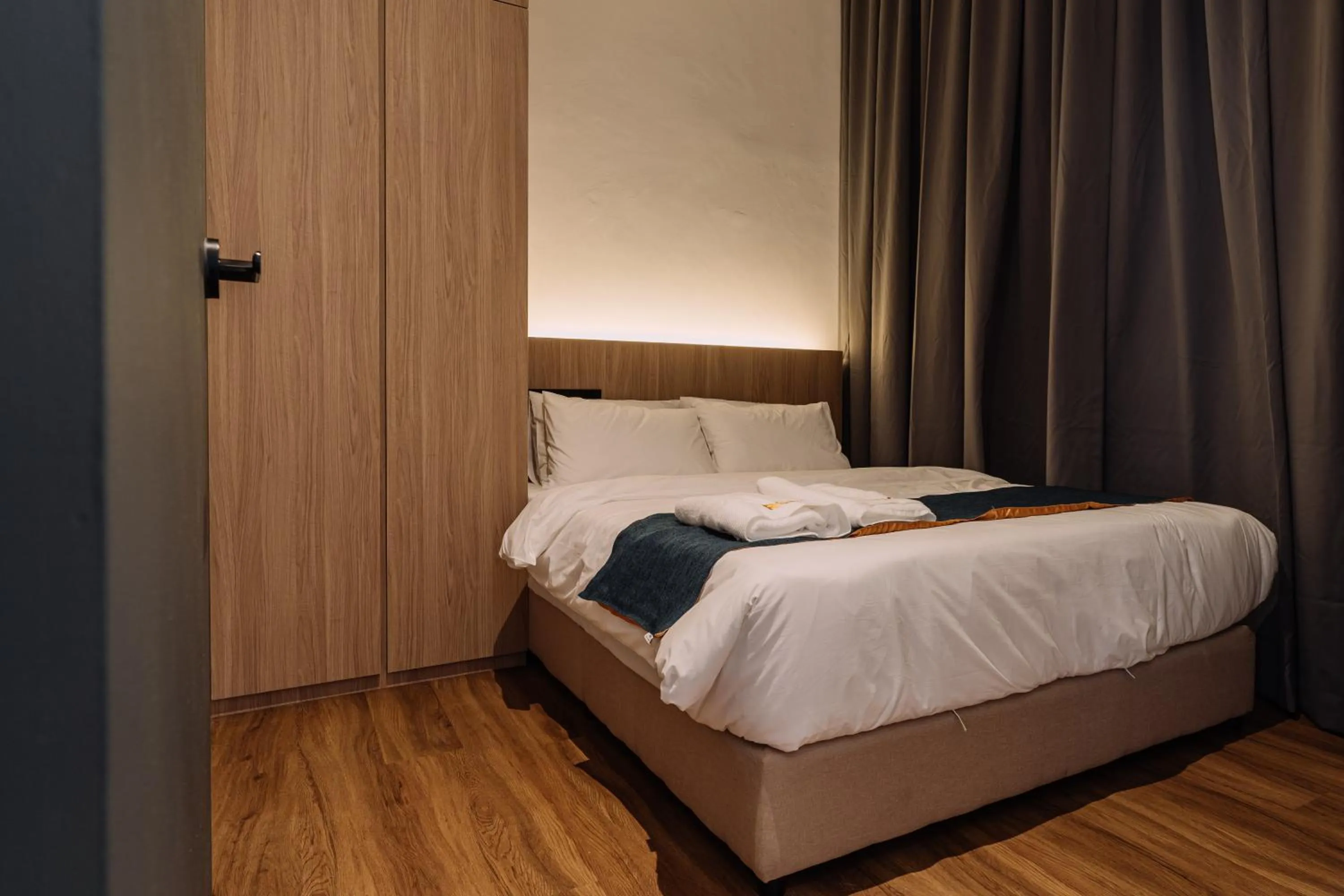 Bedroom, Bed in Impiana by Roxy Hotel