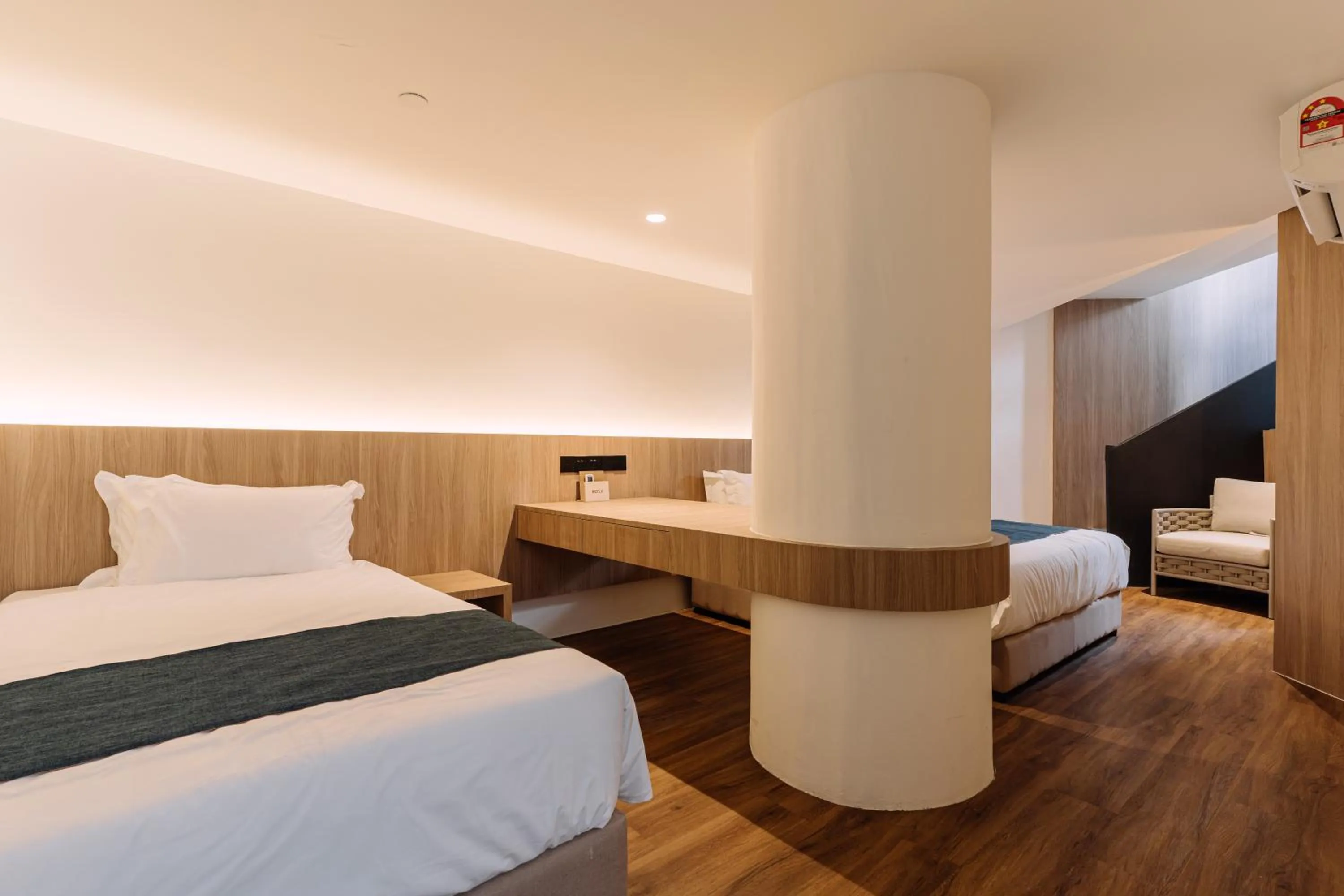 Bedroom, Bed in Impiana by Roxy Hotel