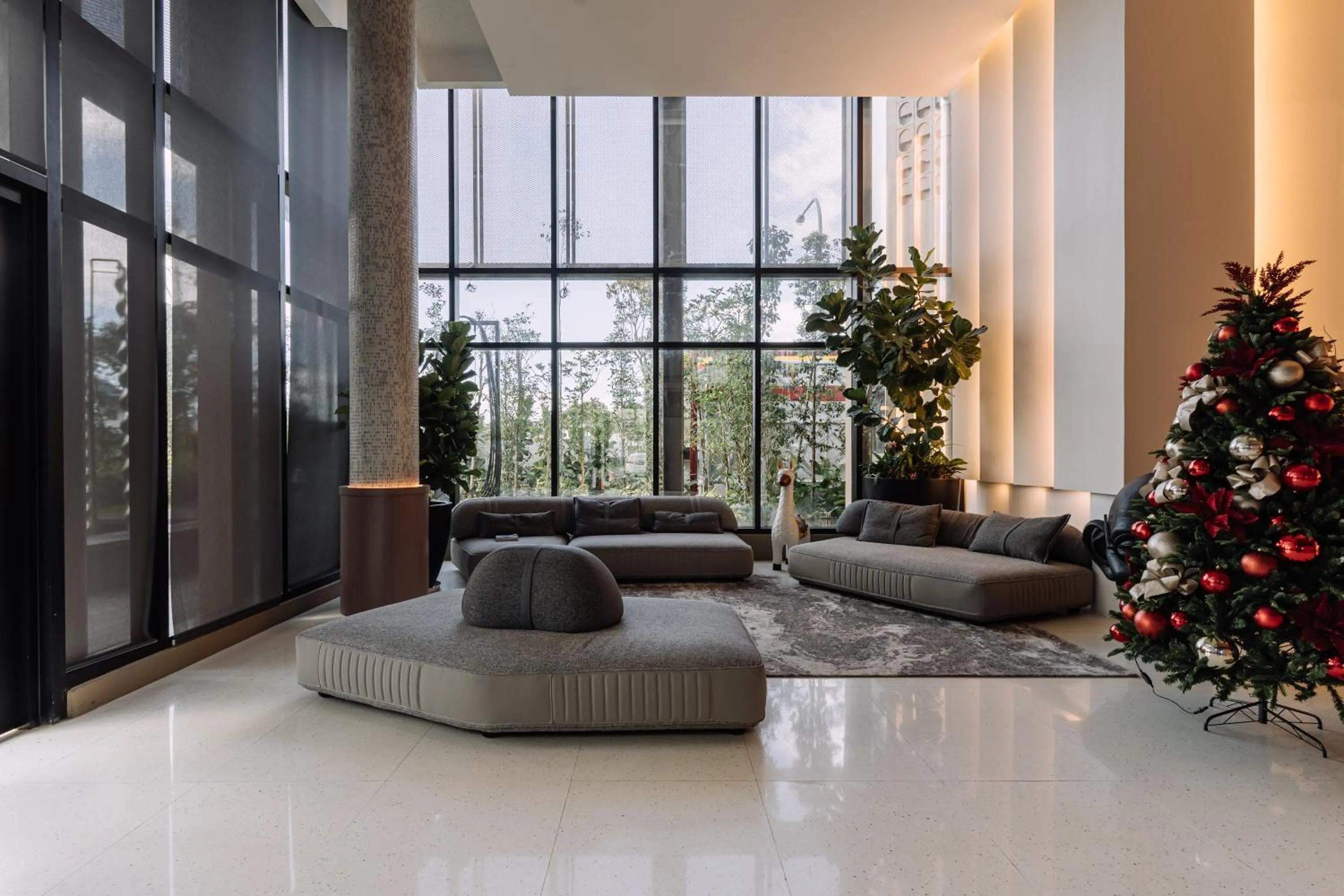 Lobby or reception in Impiana by Roxy Hotel