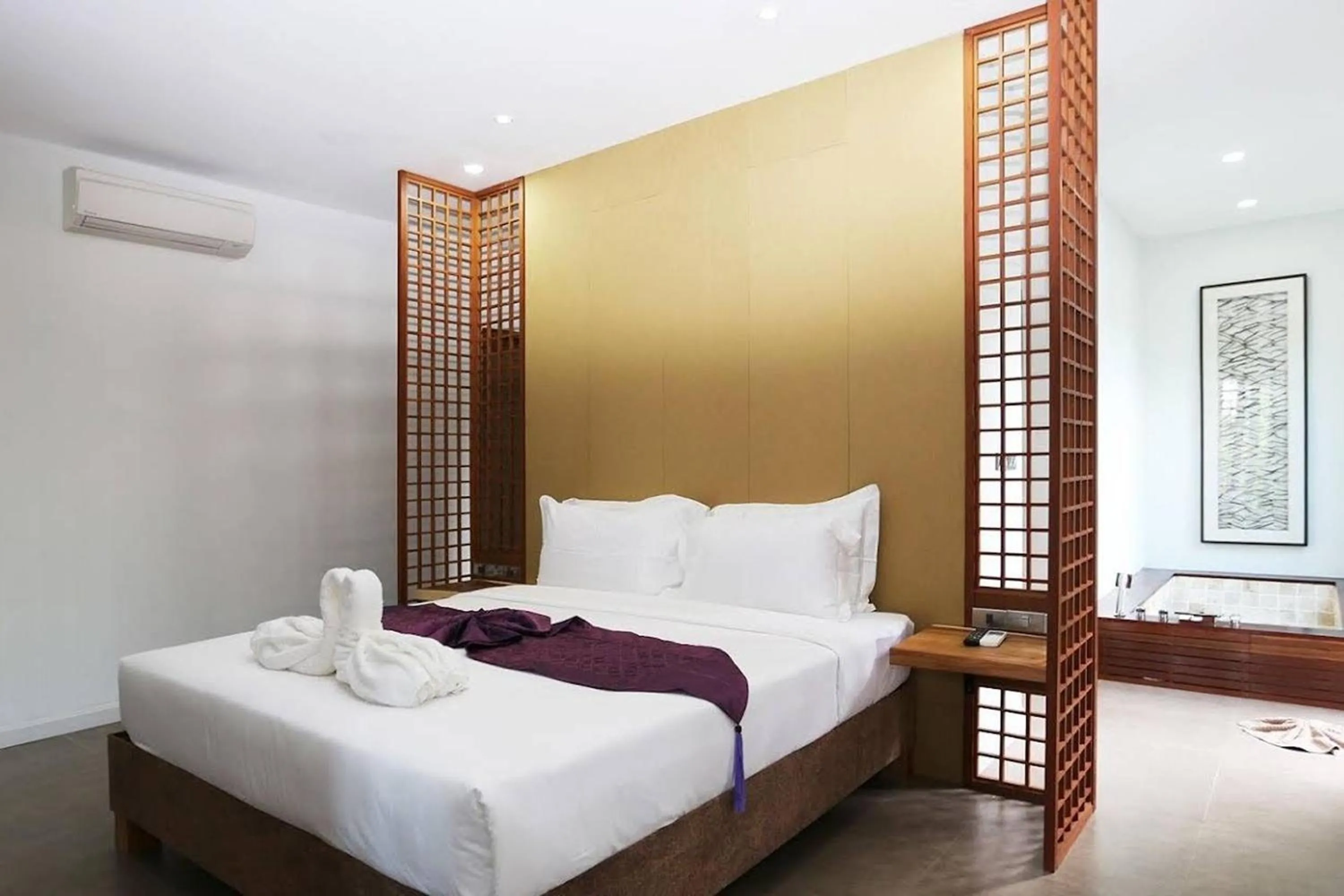 Bed in Thai Good Arts Resort