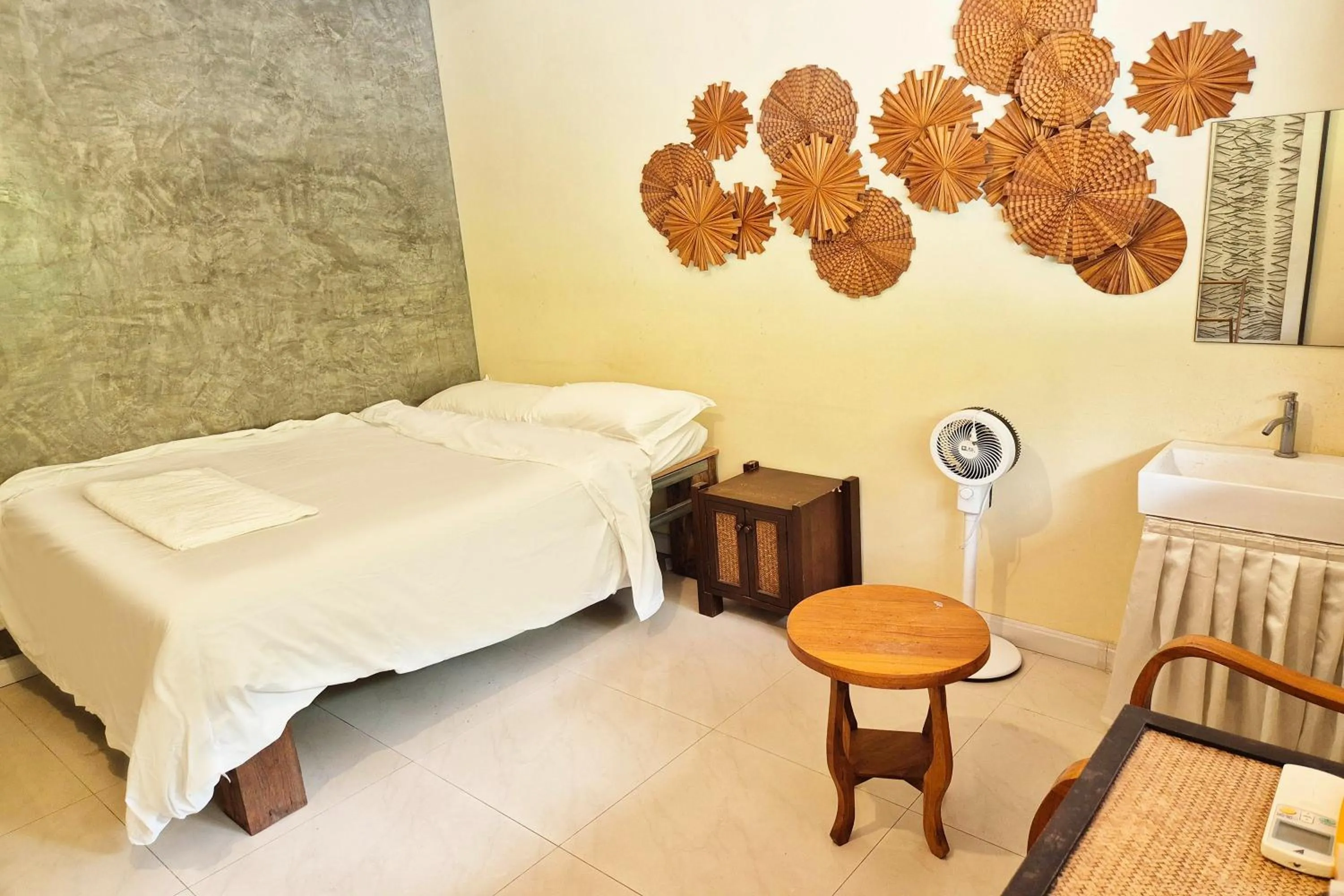 Bed in Thai Good Arts Resort