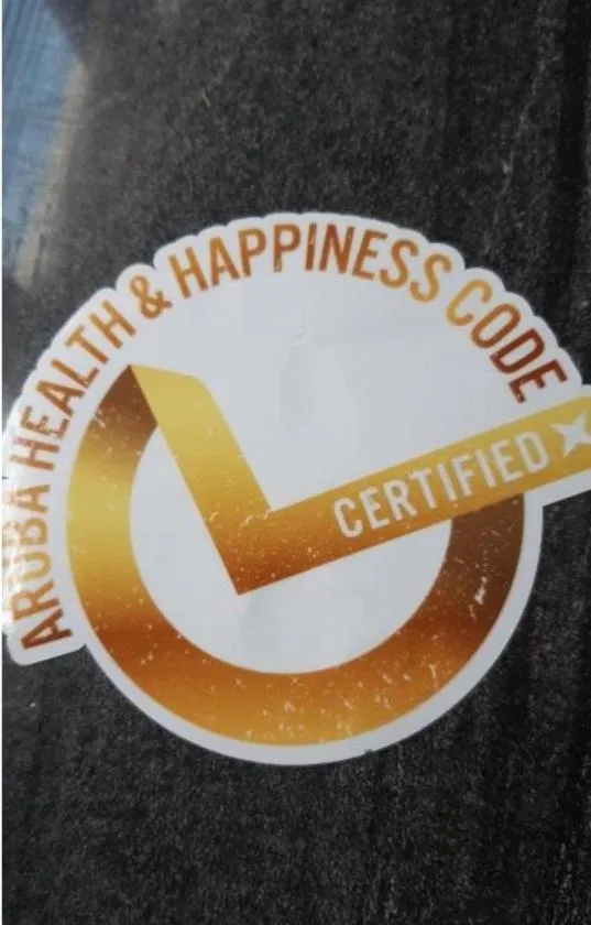 Property logo or sign in YOUR FIRST DAY Hotel on Aruba