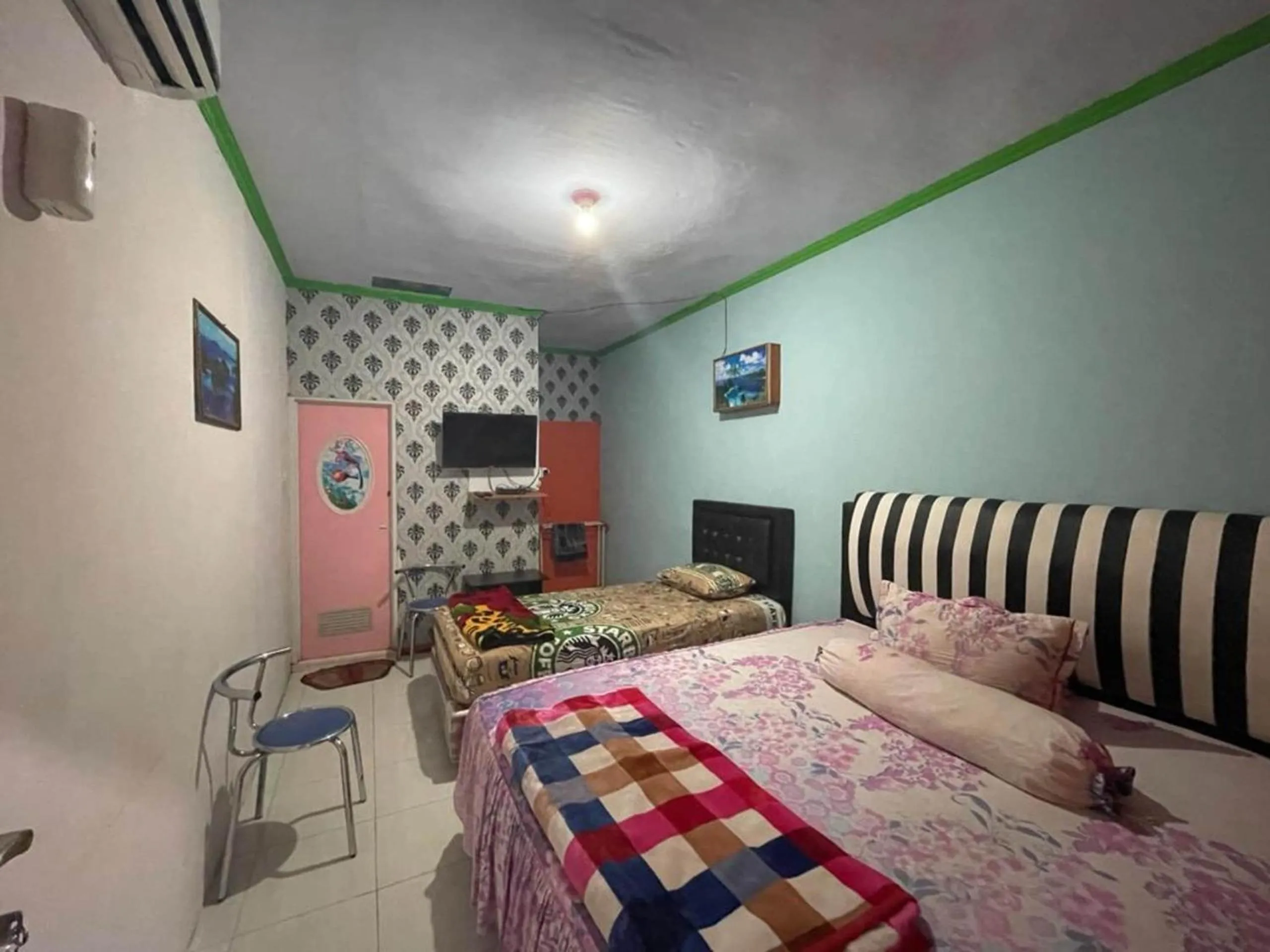 Bedroom in Hotel O Lima Saudara Syariah