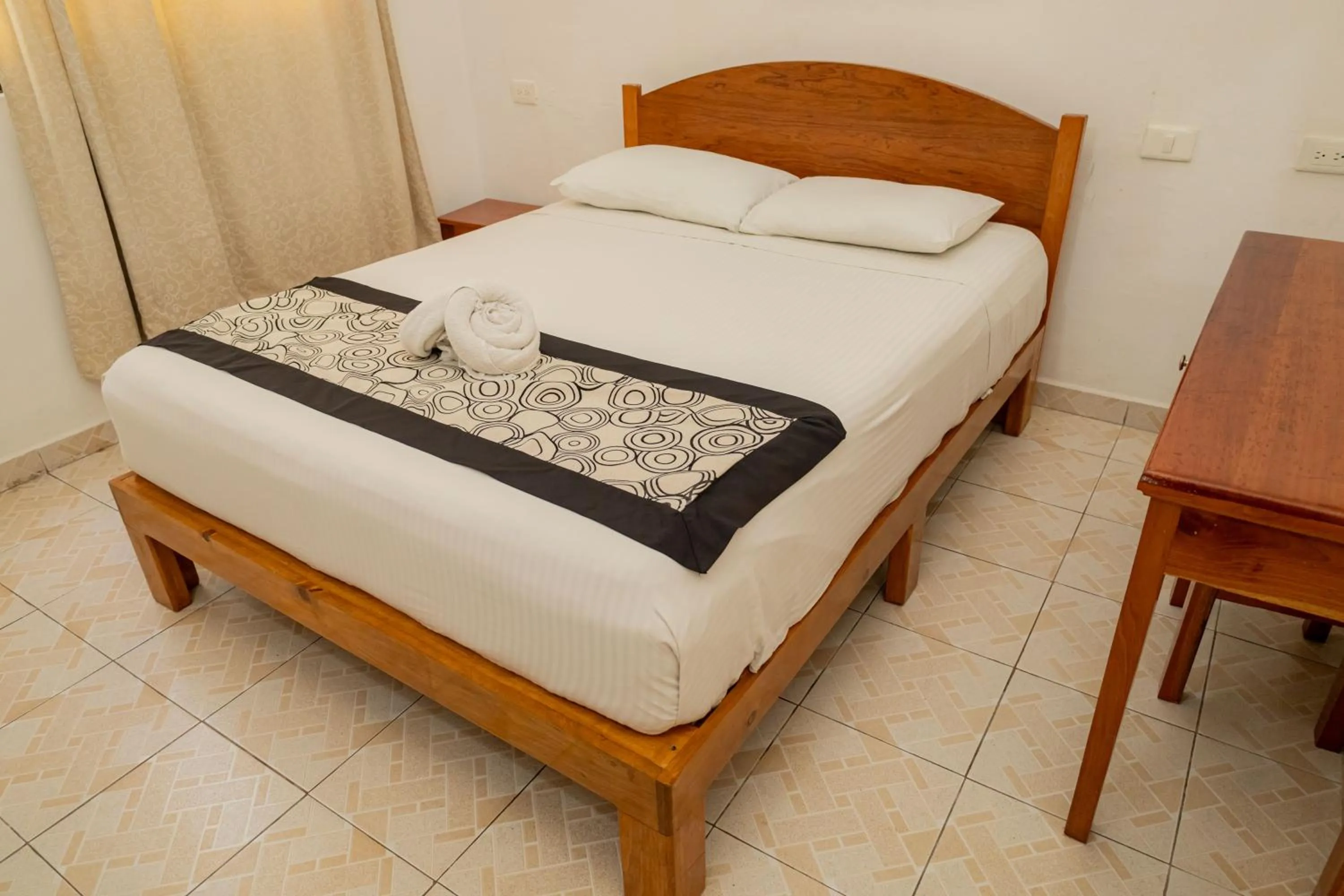 Bed in Hotel Las Palmas Cancun Centro