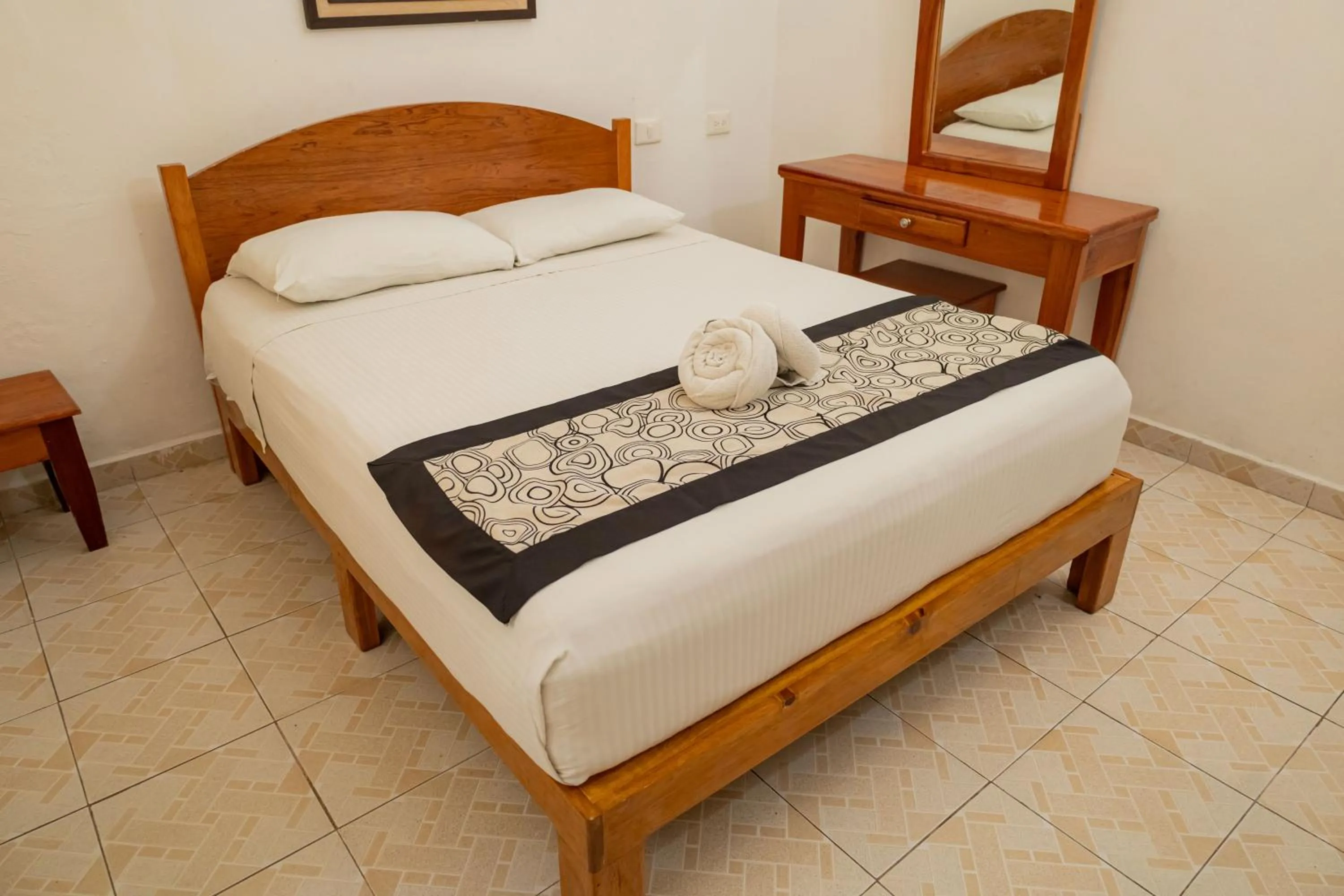 Bed in Hotel Las Palmas Cancun Centro