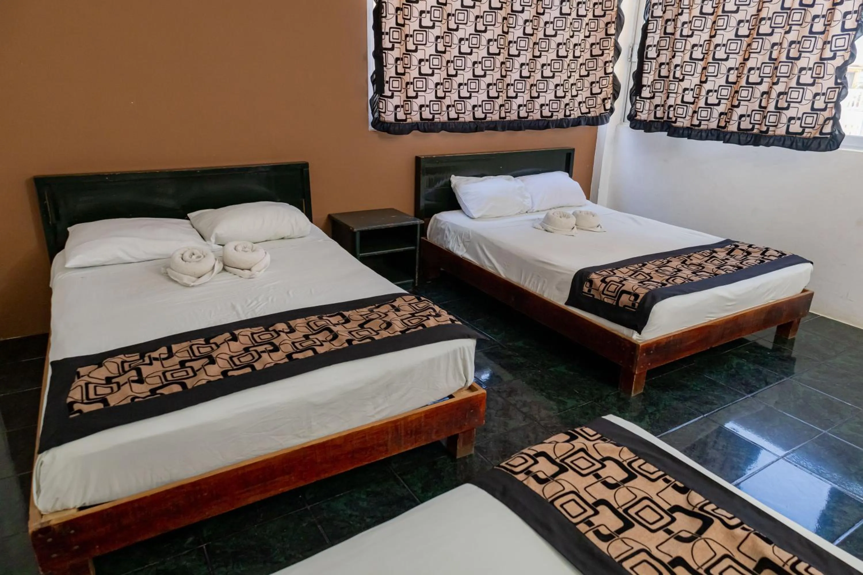 Bed in Hotel Las Palmas Cancun Centro