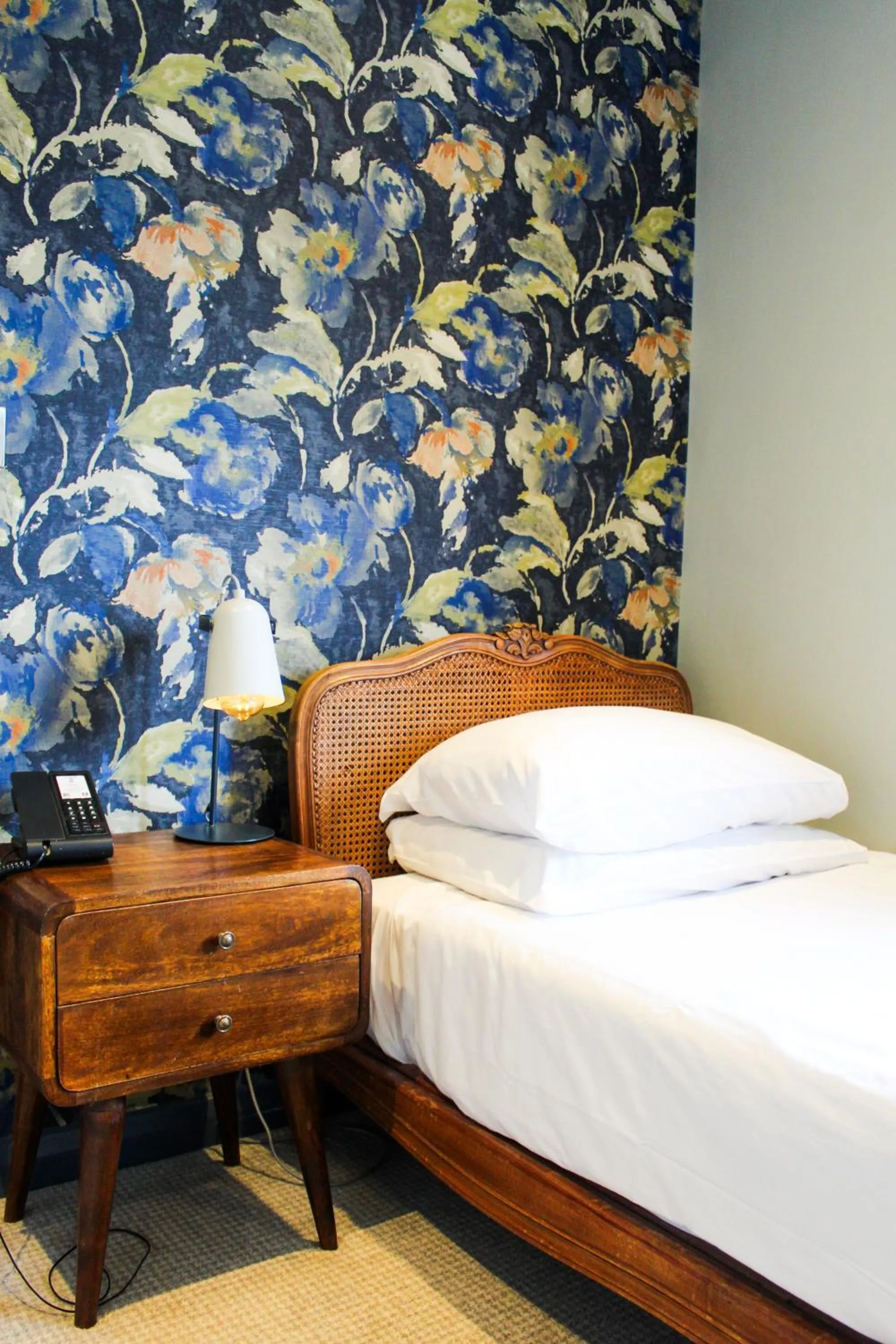 Bed in The Crescent Turner Hotel