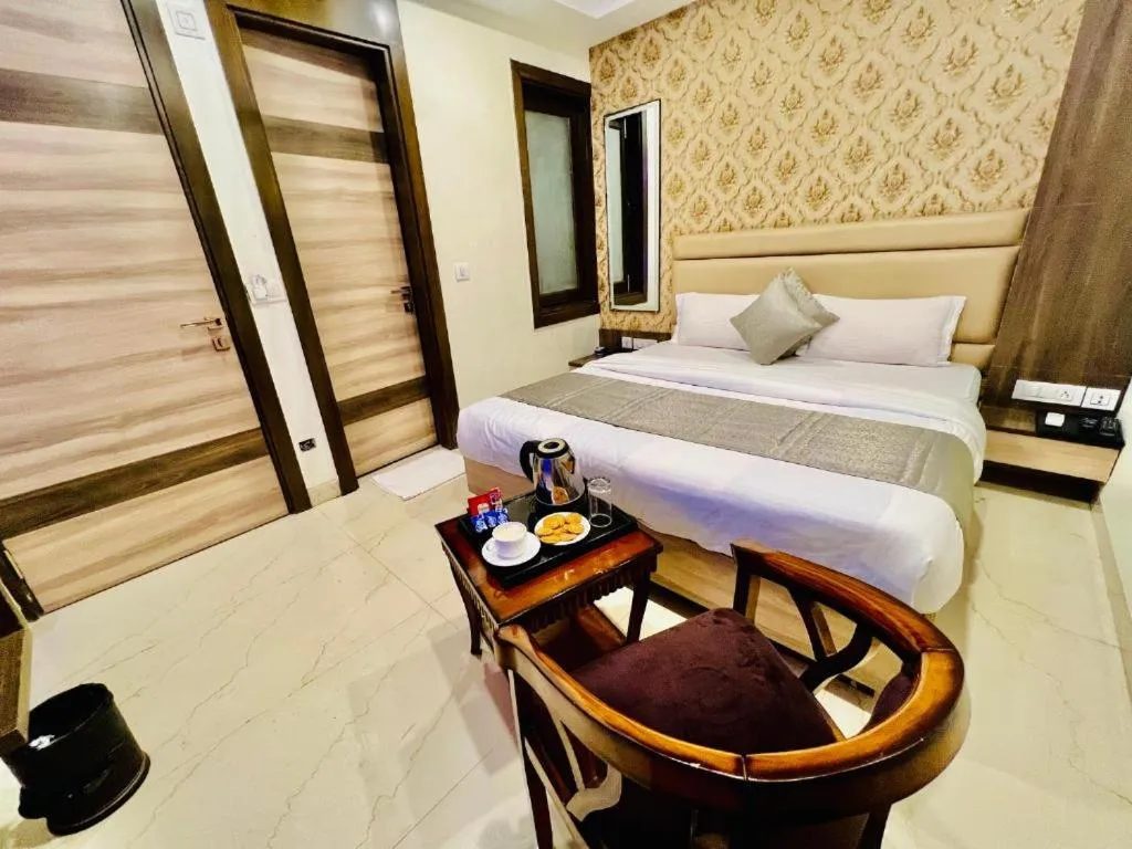 Bed in Hotel Apple Inn & Suites, New Delhi