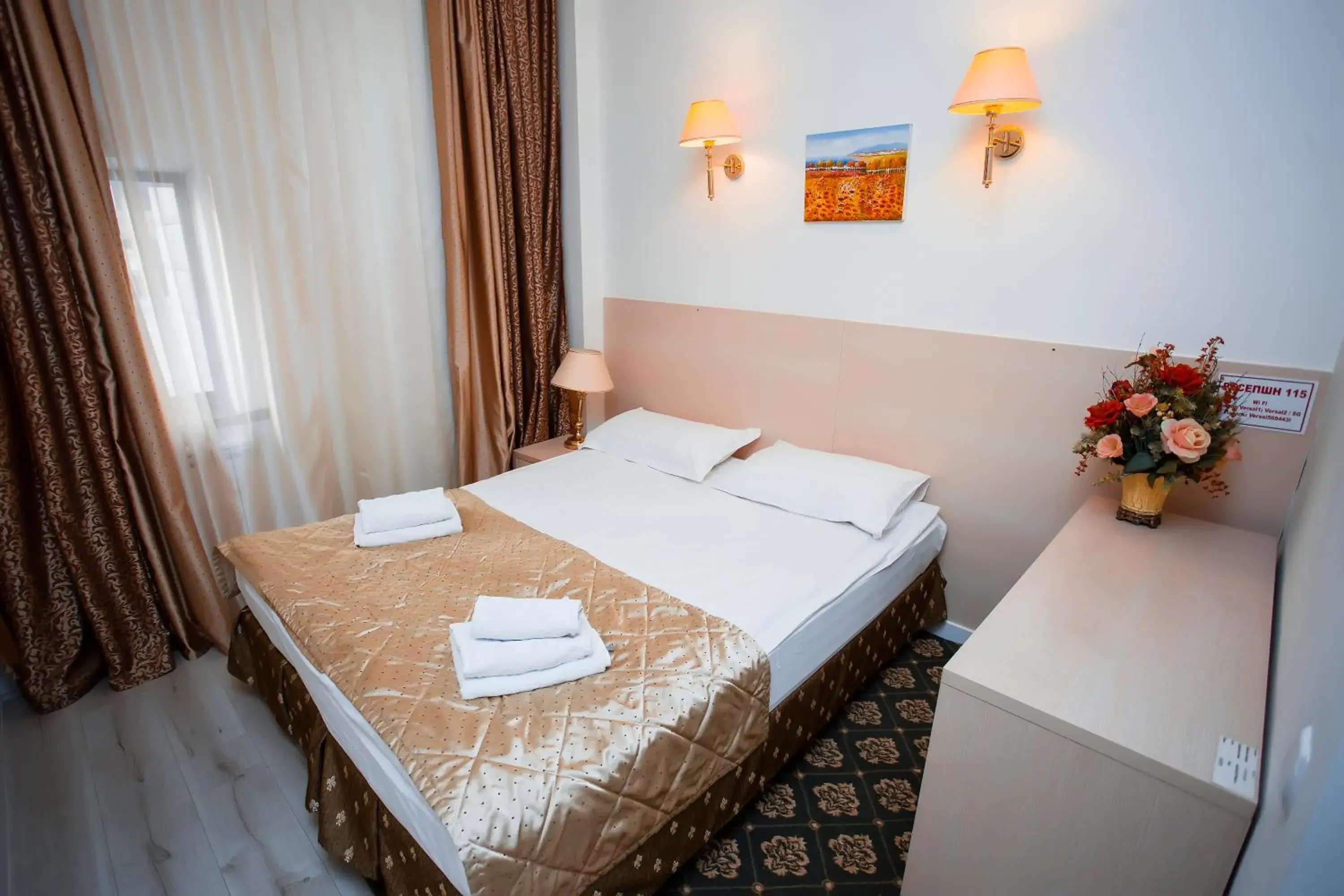 Bed in Aruna Hotel Bed in Aruna Hotel