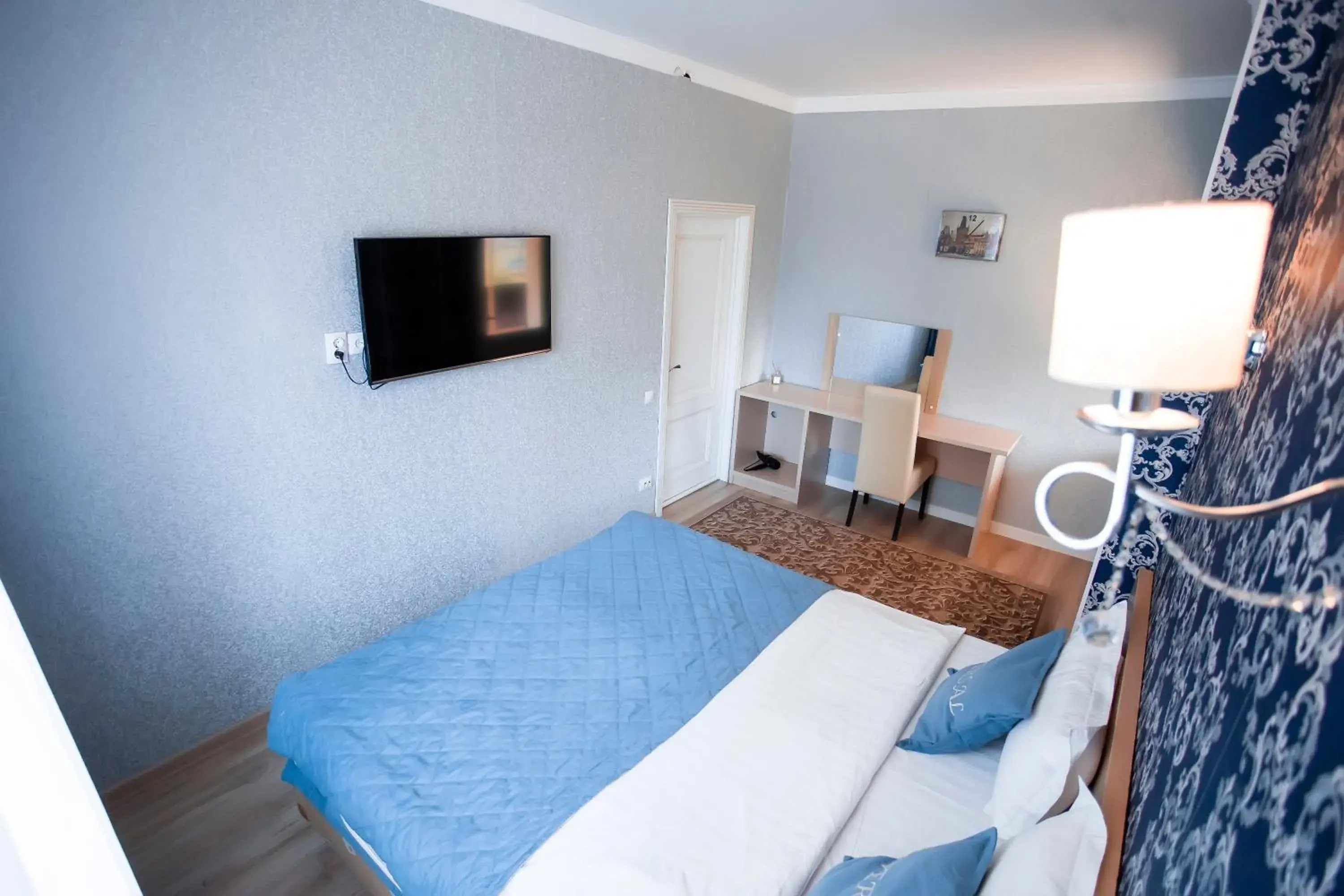 Bed in Aruna Hotel Bed in Aruna Hotel