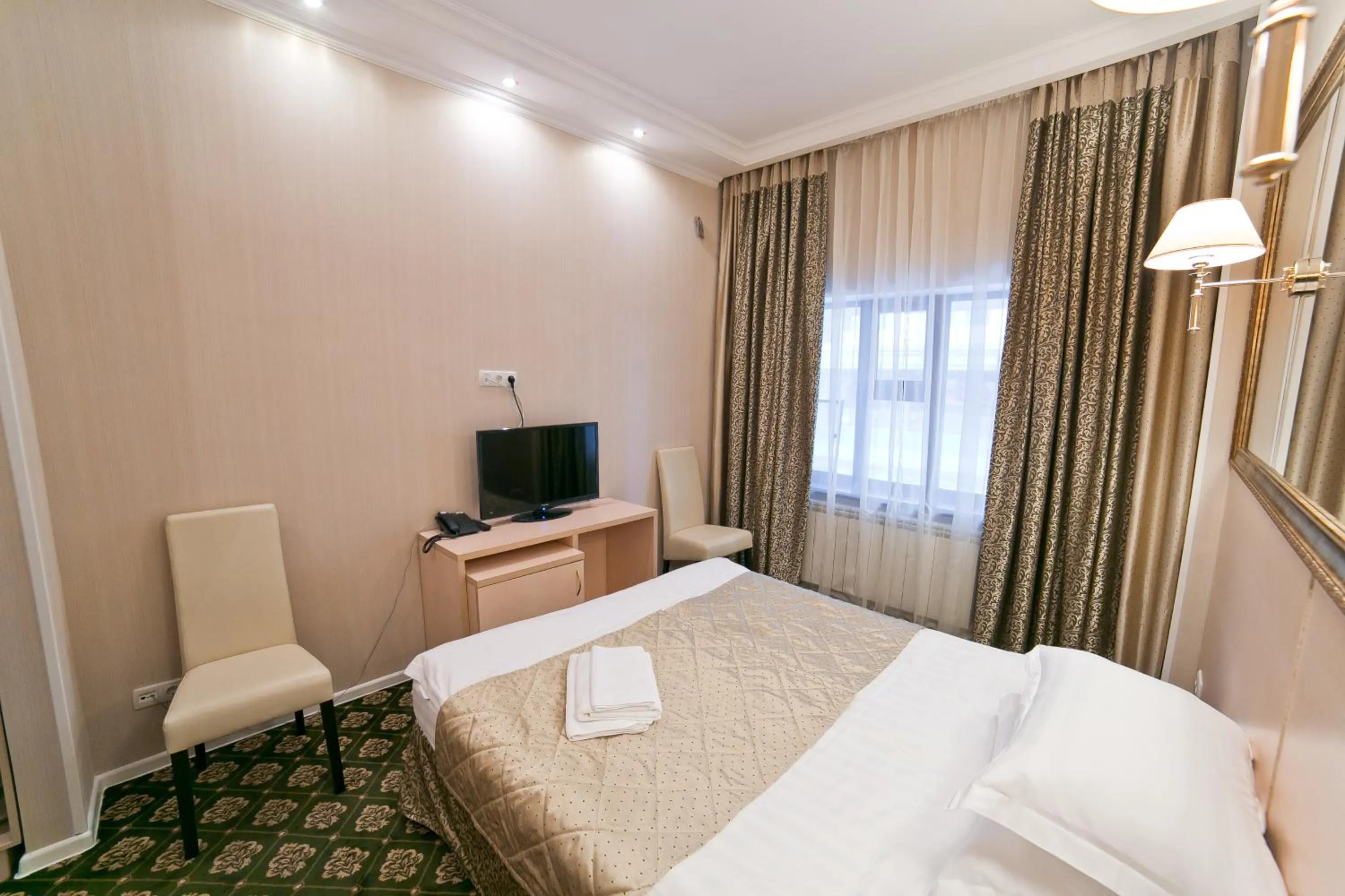 Photo of the whole room, Bed in Versal Hotel