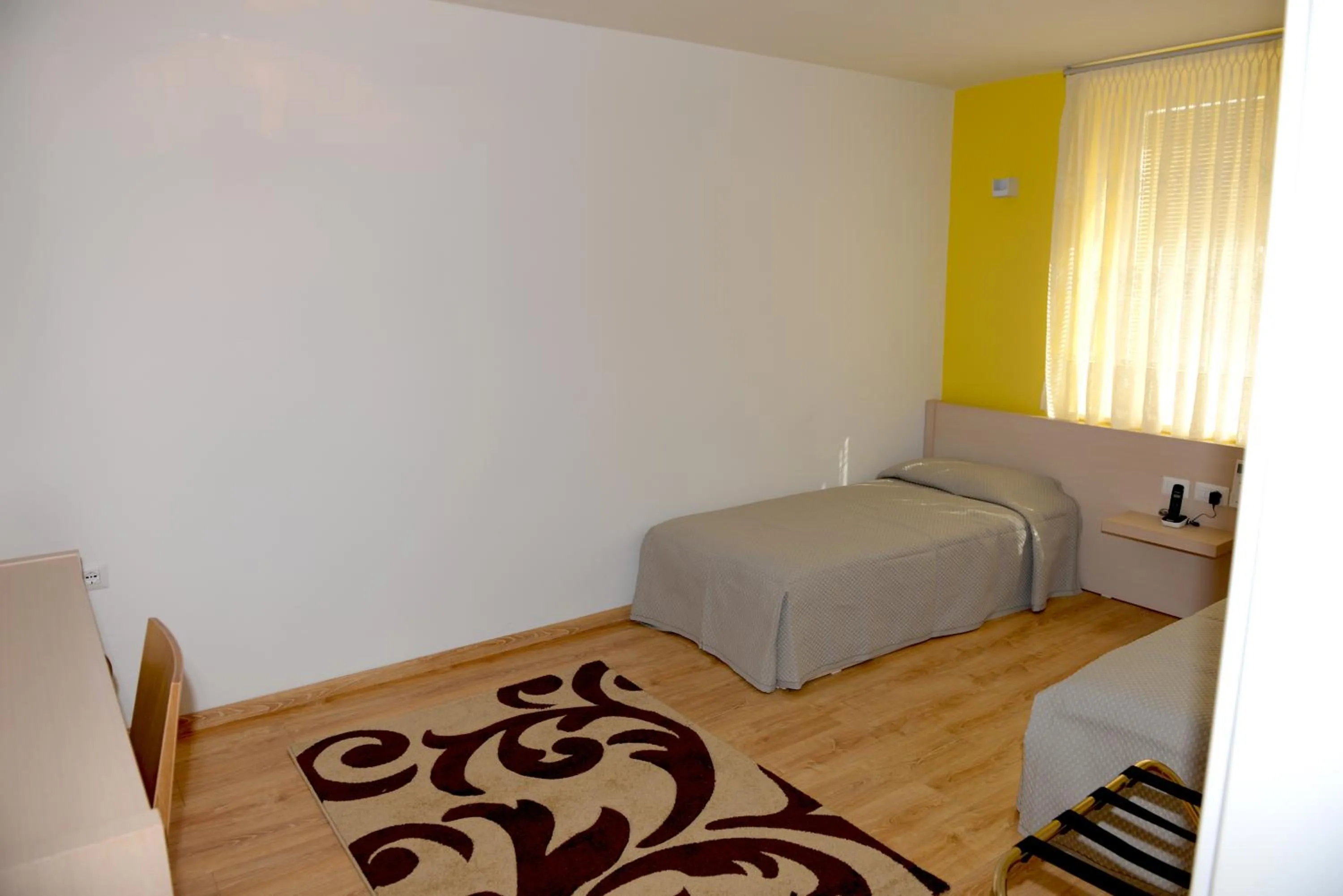 Decorative detail, Bed in Grand White City Hotel