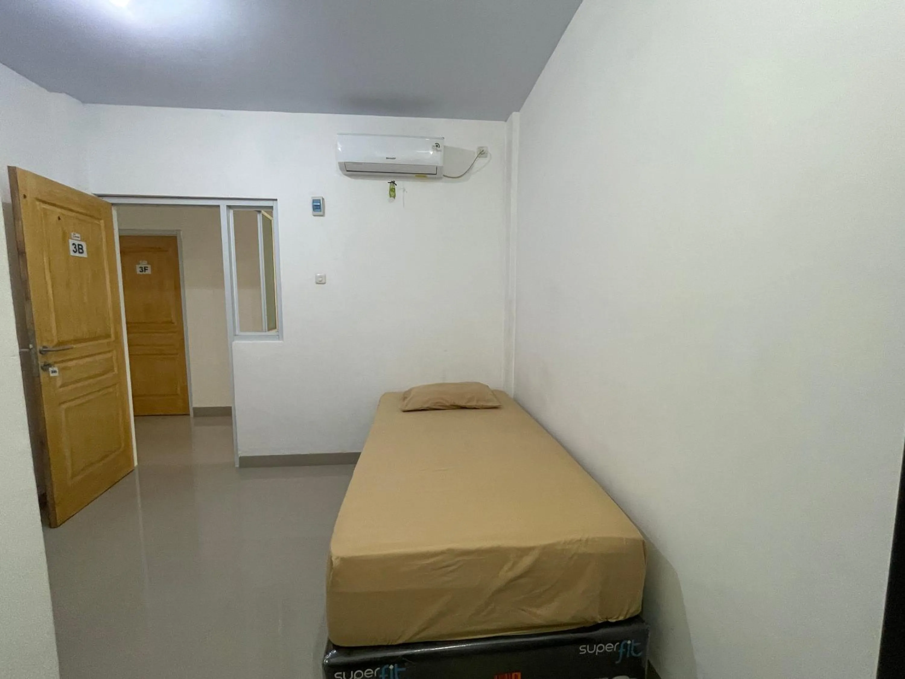 Bedroom, Bed in Hotel O Penginapan Musafir Syariah Near Paramount Woman & Childern's Hospital