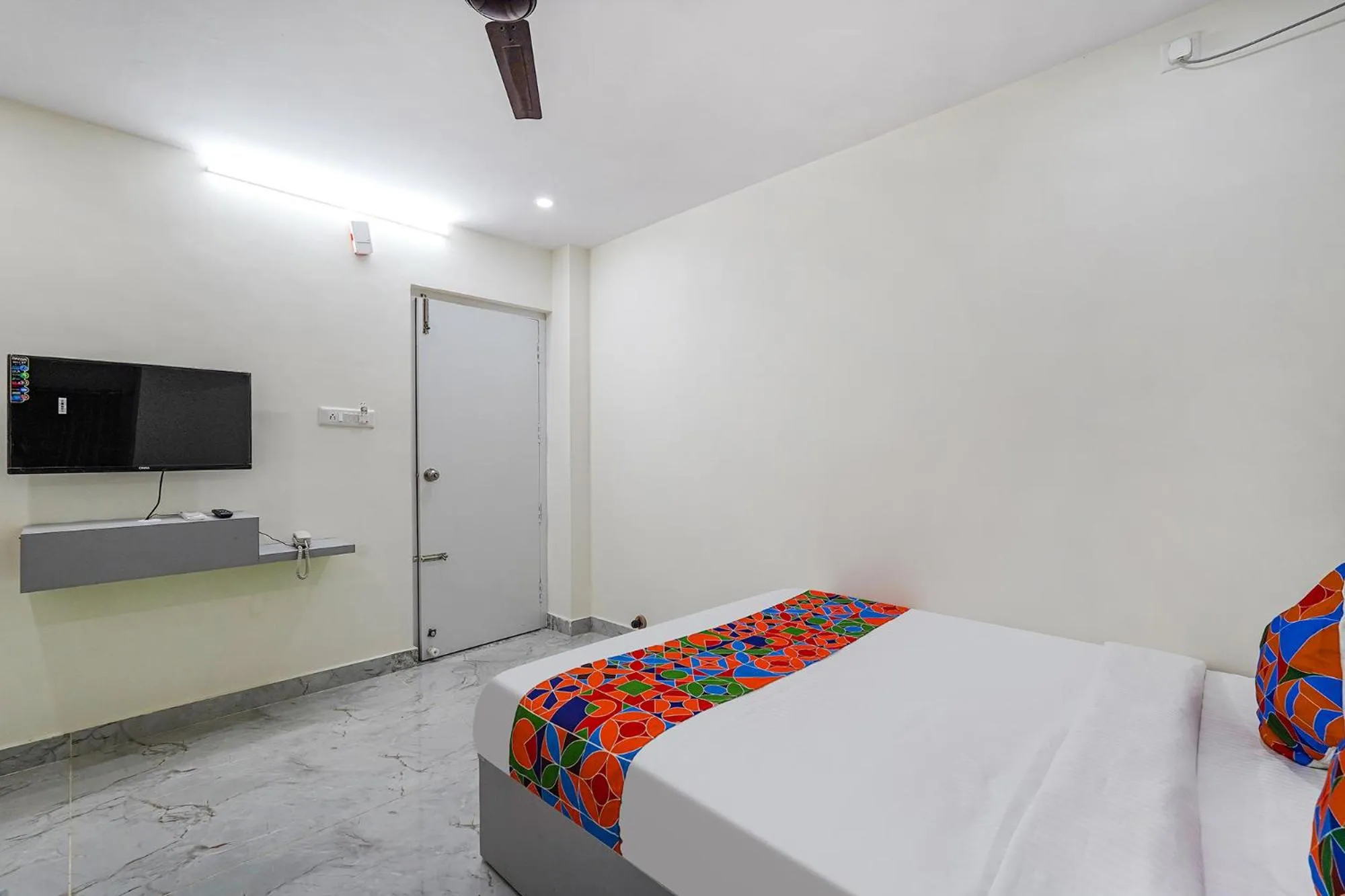 Bed in FabHotel Ivory Pearl - Nr Sony Signal