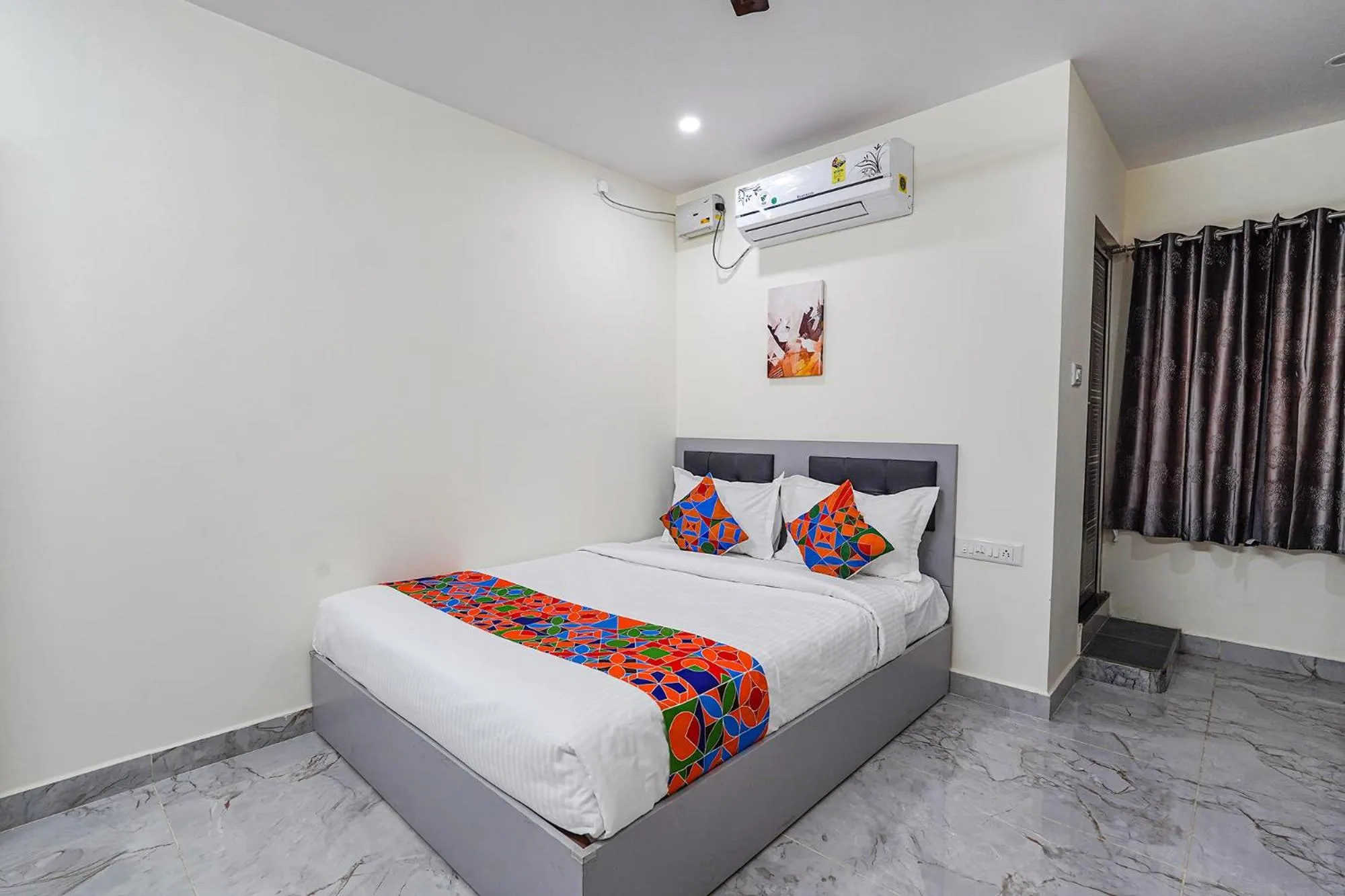 Bed in FabHotel Ivory Pearl - Nr Sony Signal