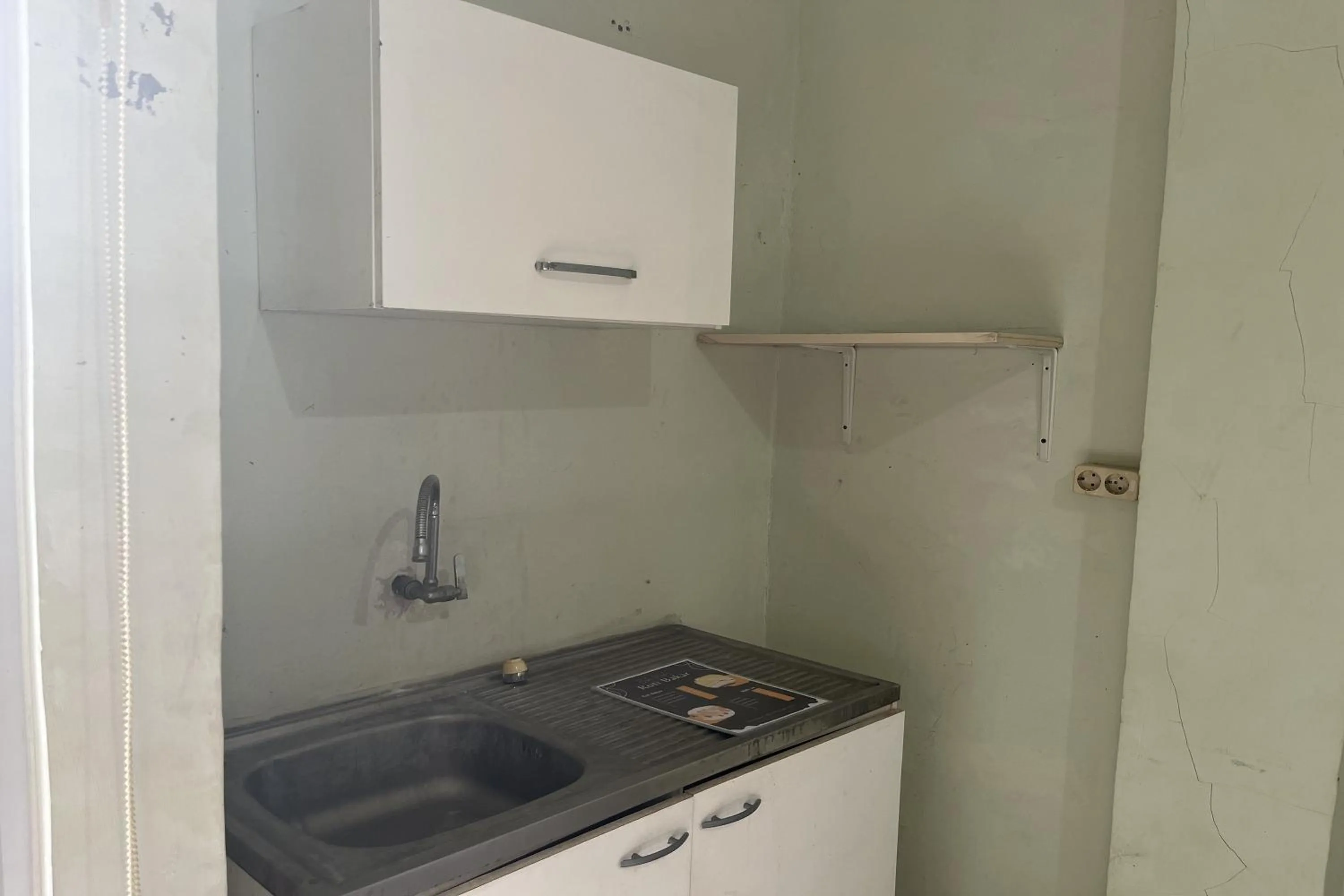 Kitchen or kitchenette in Sultan Residence Syariah